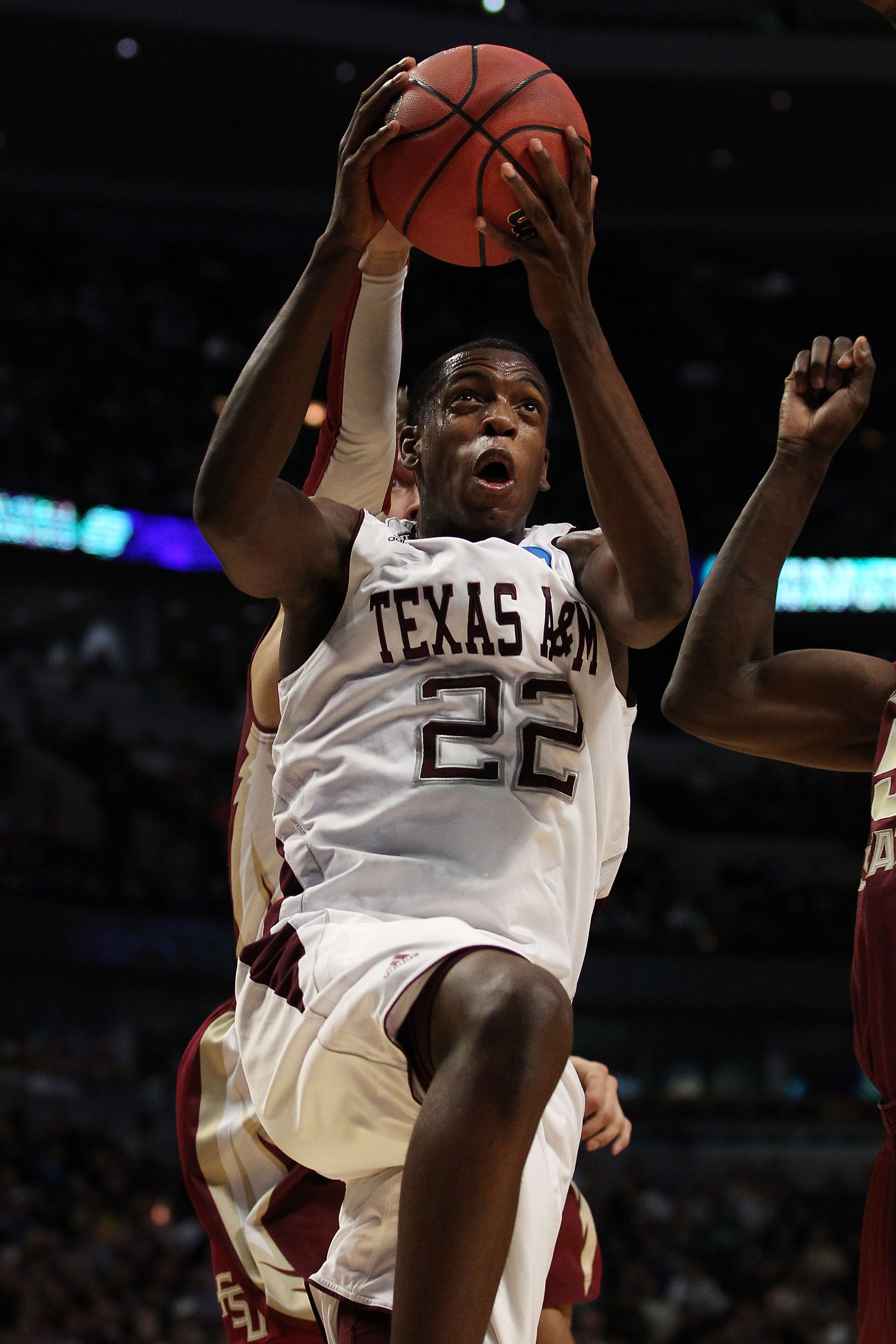 CHICAGO, IL - MARCH 18:  Khris Middleton #22 of the Texas A&M Aggies shoots against the Florida State Seminoles in the first half during the second round of the 2011 NCAA men's basketball tournament at the United Center on March 18, 2011 in Chicago, Illin