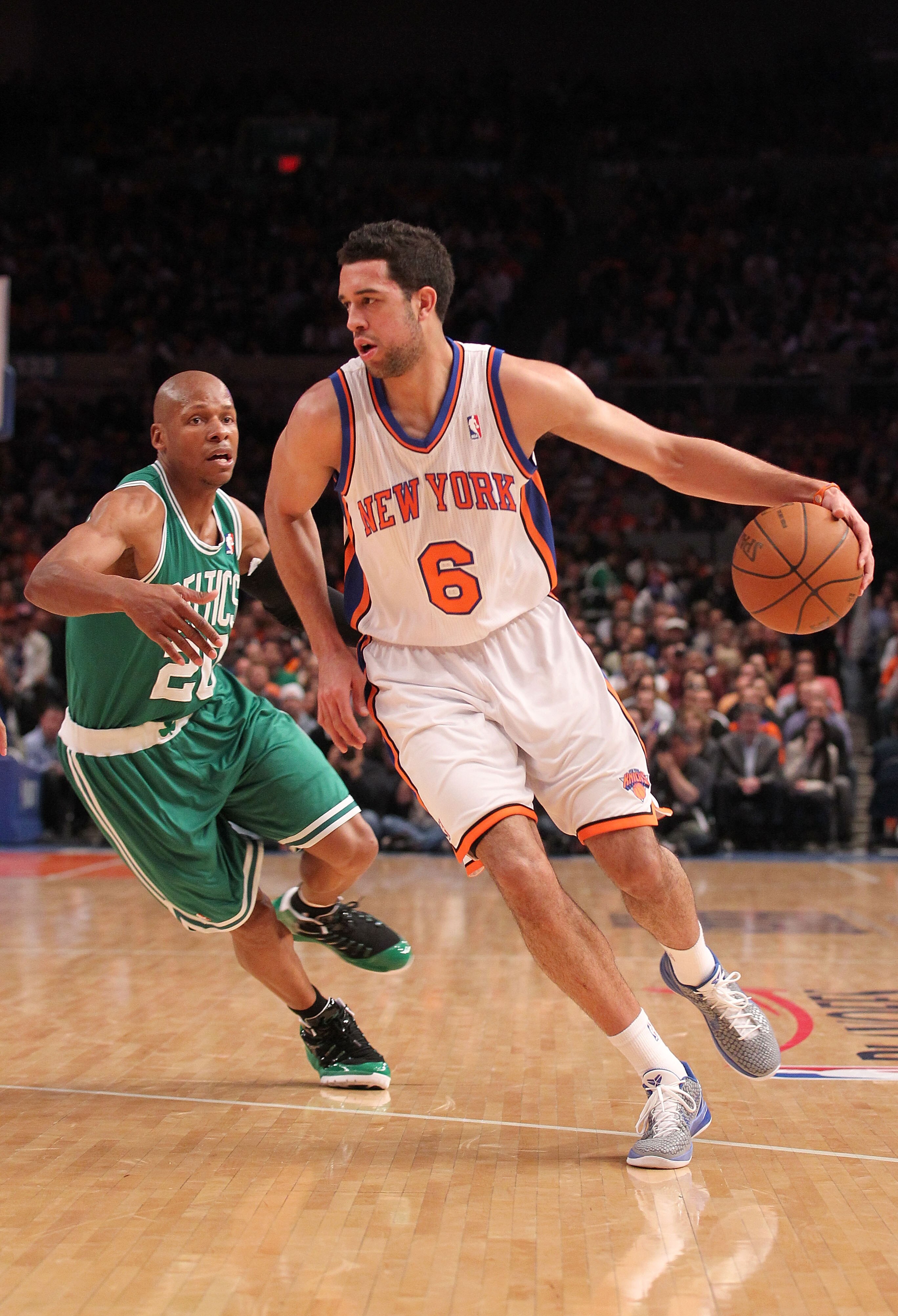 NEW YORK, NY - APRIL 22:  Landry Fields #6 of the New York Knicks drives against Ray Allen #20 of the Boston Celtics in Game Three of the Eastern Conference Quarterfinals in the 2011 NBA Playoffs on April 22, 2011 at Madison Square Garden in New York City