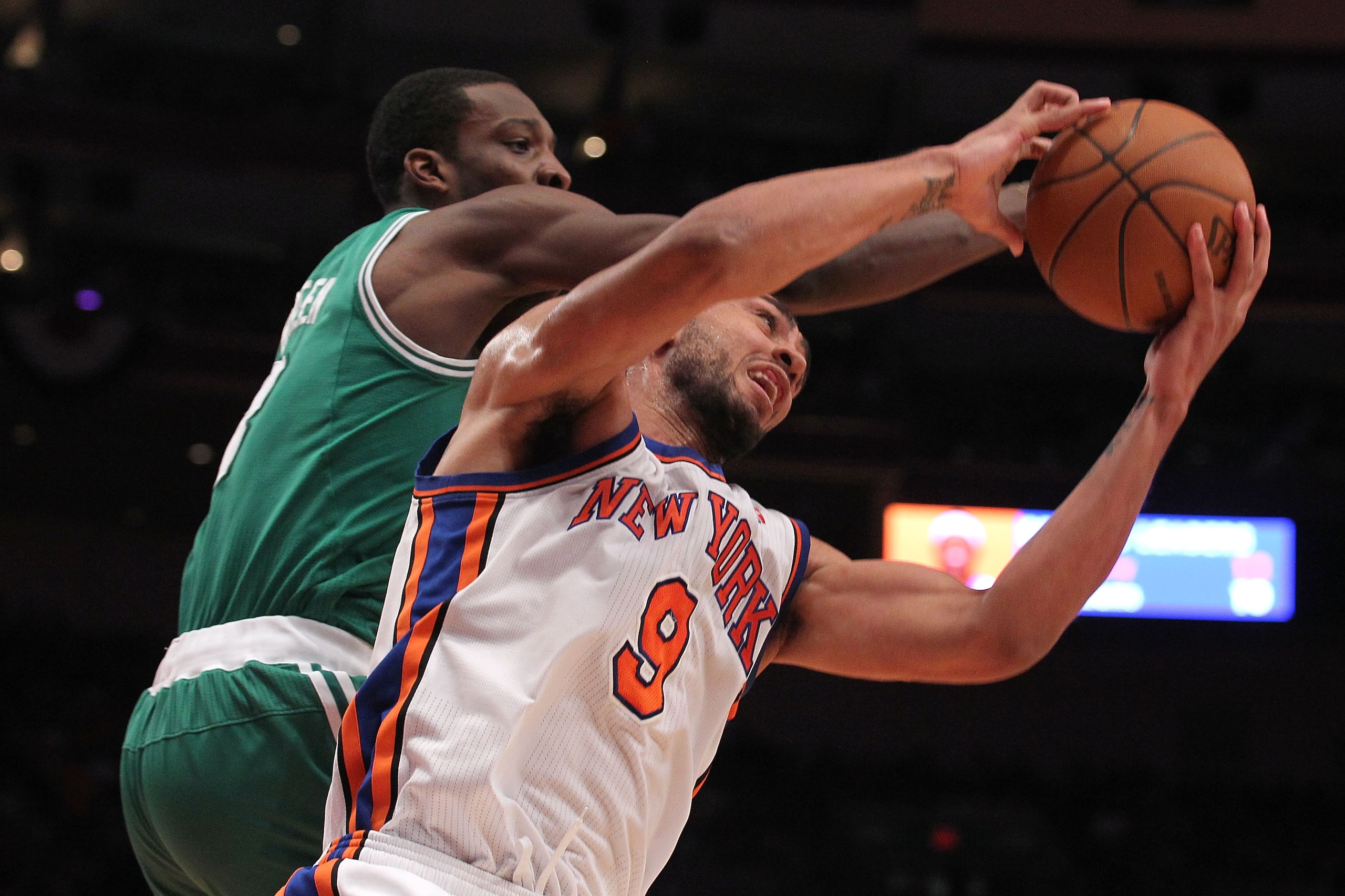 NEW YORK, NY - APRIL 22:  Jared Jeffries #9 of the New York Knicks fights for a rebound against Jeff Green #8 of the Boston Celtics in Game Three of the Eastern Conference Quarterfinals in the 2011 NBA Playoffs on April 22, 2011 at Madison Square Garden i
