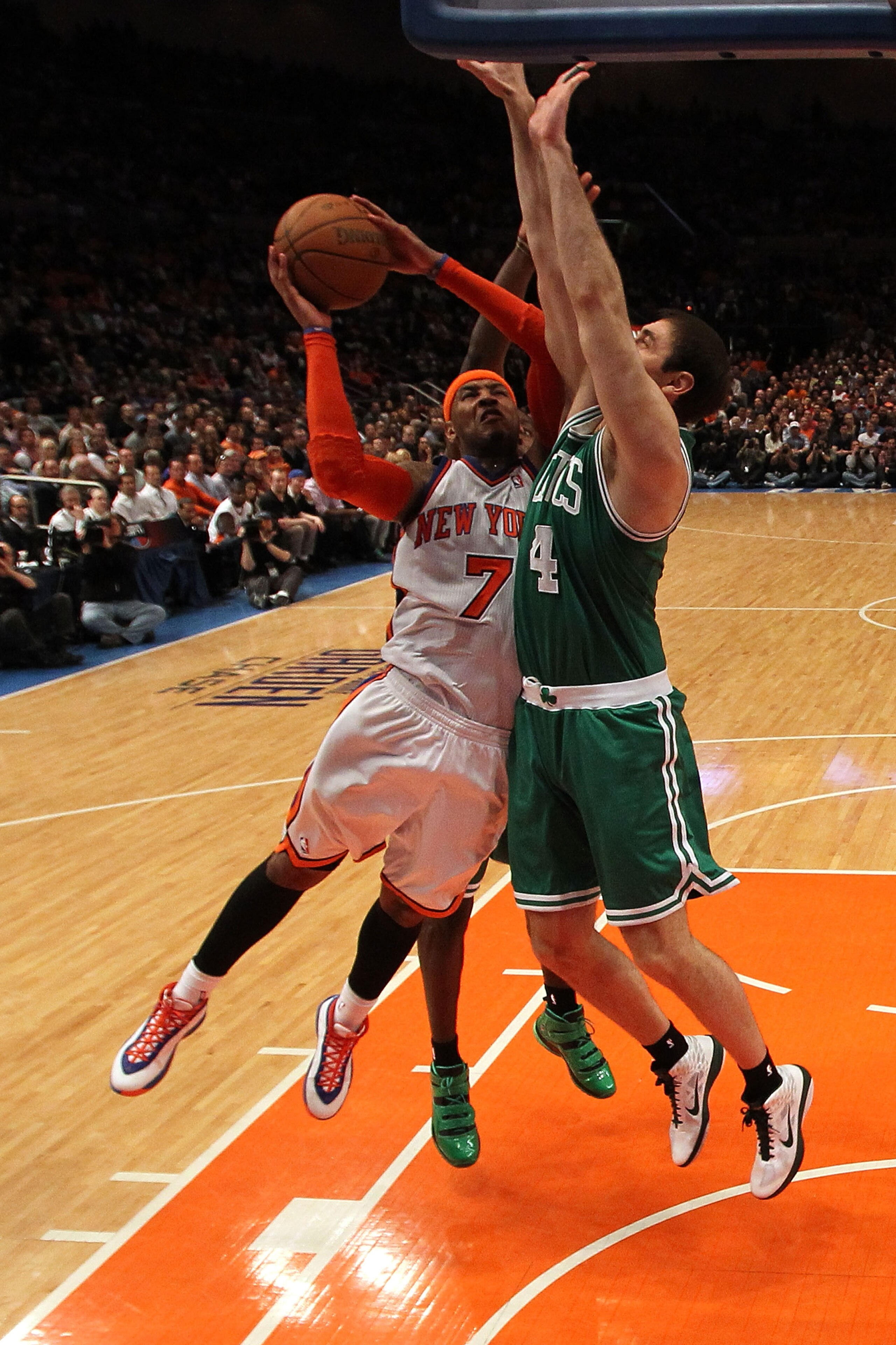 NEW YORK, NY - APRIL 22:  Carmelo Anthony #7 of the New York Knicks drives for a shot attempt against Nenad Krstic #4 of the Boston Celtics in Game Three of the Eastern Conference Quarterfinals in the 2011 NBA Playoffs on April 22, 2011 at Madison Square
