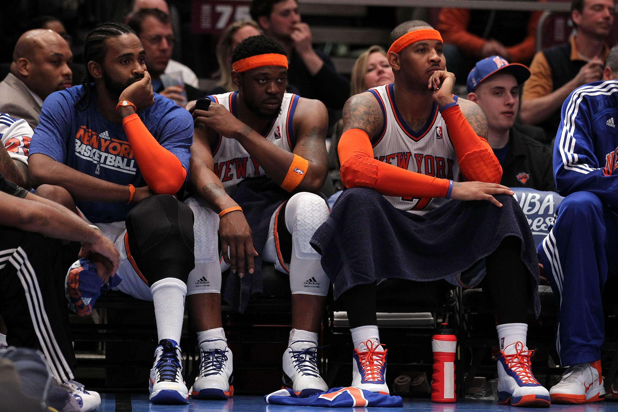 NEW YORK, NY - APRIL 22: (L-R) Ronny Turiaf #14, Bill Walker #5 and Carmelo Anthony #7 of the New York Knicks look on dejected from the bench against the Boston Celtics in Game Three of the Eastern Conference Quarterfinals in the 2011 NBA Playoffs on Apr NEW YORK, NY - APRIL 22: (L-R) Ronny Turiaf #14, Bill Walker #5 and Carmelo Anthony #7 of the New York Knicks look on dejected from the bench against the Boston Celtics in Game Three of the Eastern Conference Quarterfinals in the 2011 NBA Playoffs on Apr