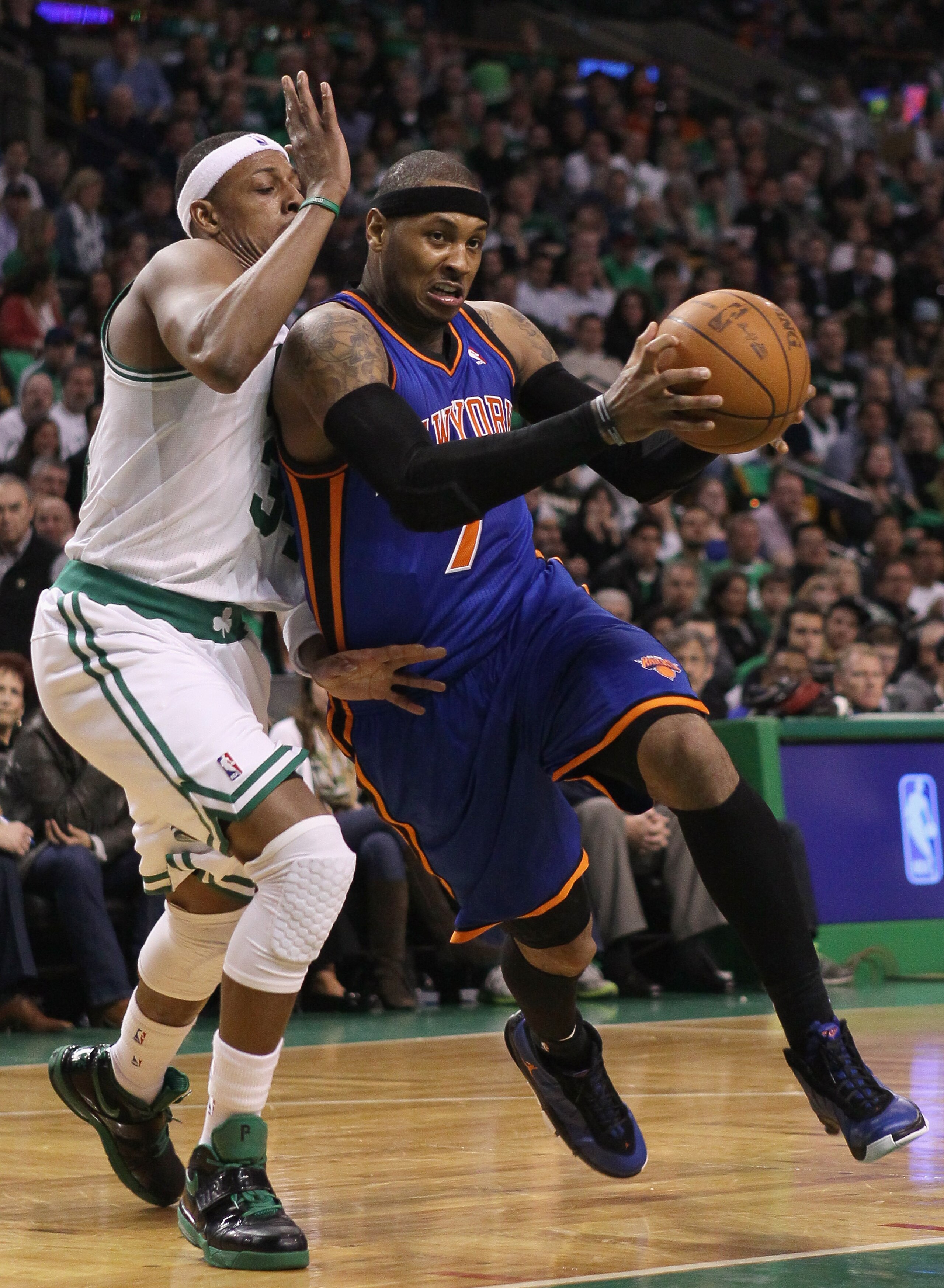 BOSTON, MA - APRIL 17: Carmelo Anthony #7 of the New York Knicks heads for the net as Paul Pierce #34 of the Boston Celtics defends in Game One of the Eastern Conference Quarterfinals in the 2011 NBA Playoffs on April 17, 2011 at the TD Garden in Boston, BOSTON, MA - APRIL 17: Carmelo Anthony #7 of the New York Knicks heads for the net as Paul Pierce #34 of the Boston Celtics defends in Game One of the Eastern Conference Quarterfinals in the 2011 NBA Playoffs on April 17, 2011 at the TD Garden in Boston,