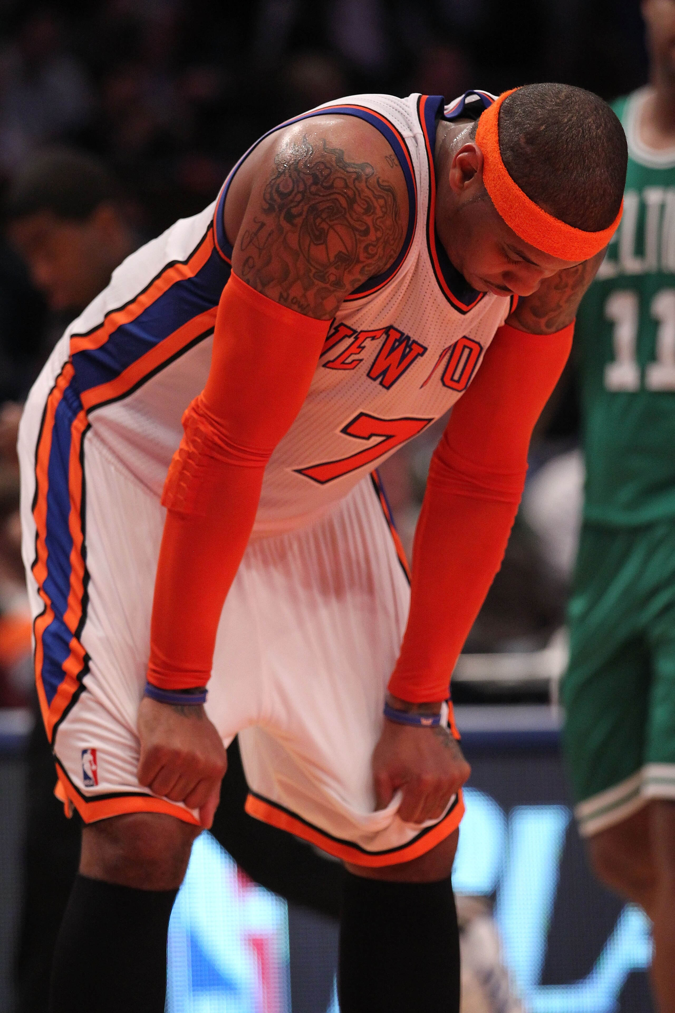 NEW YORK, NY - APRIL 22: Carmelo Anthony #7 of the New York Knicks stands on the court with his head down against the Boston Celtics in Game Three of the Eastern Conference Quarterfinals in the 2011 NBA Playoffs on April 22, 2011 at Madison Square Garden NEW YORK, NY - APRIL 22: Carmelo Anthony #7 of the New York Knicks stands on the court with his head down against the Boston Celtics in Game Three of the Eastern Conference Quarterfinals in the 2011 NBA Playoffs on April 22, 2011 at Madison Square Garden