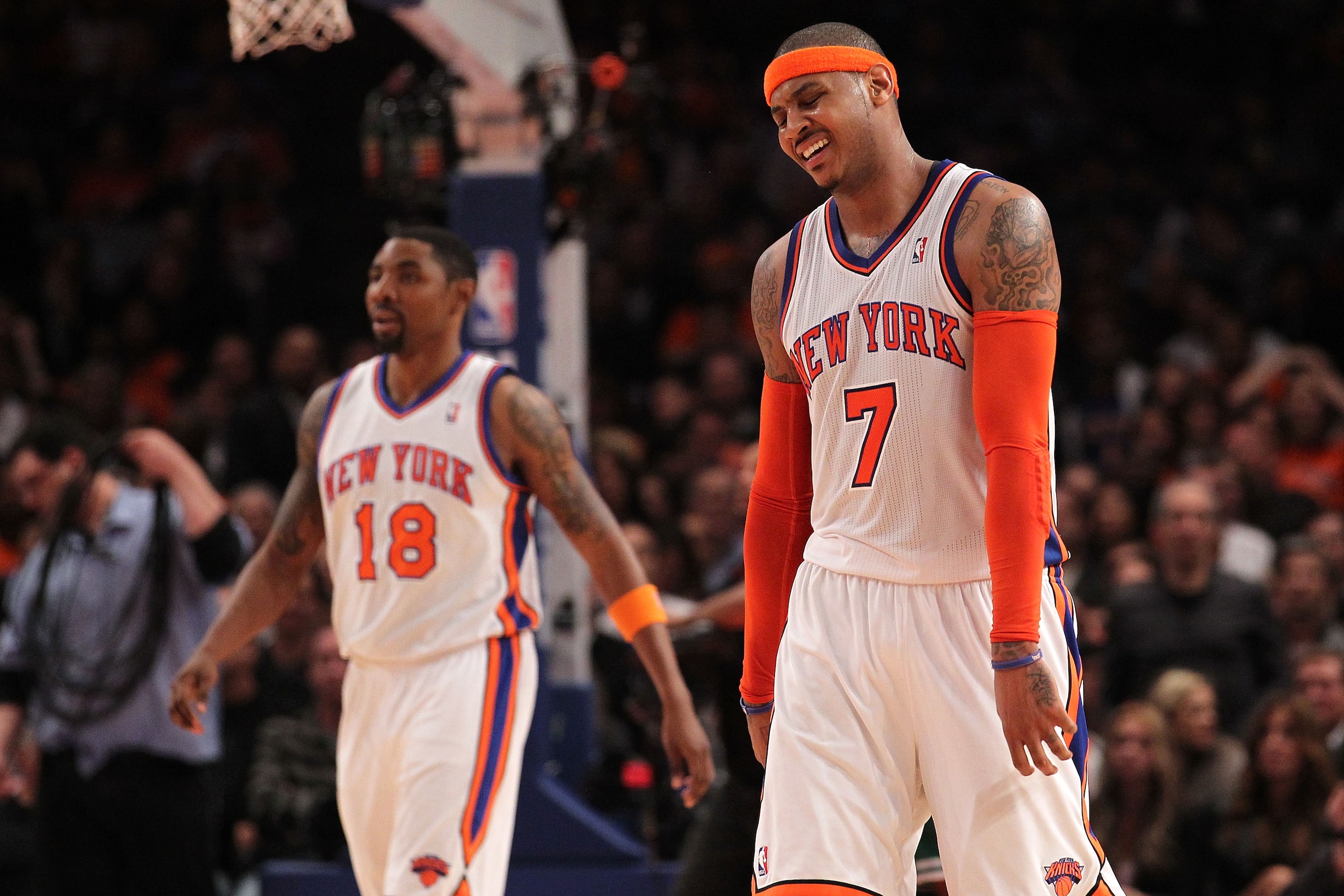 NEW YORK, NY - APRIL 22: (L-R) Roger Mason #18 and Carmelo Anthony #7 of the New York Knicks react against the Boston Celtics in Game Three of the Eastern Conference Quarterfinals in the 2011 NBA Playoffs on April 22, 2011 at Madison Square Garden in New NEW YORK, NY - APRIL 22: (L-R) Roger Mason #18 and Carmelo Anthony #7 of the New York Knicks react against the Boston Celtics in Game Three of the Eastern Conference Quarterfinals in the 2011 NBA Playoffs on April 22, 2011 at Madison Square Garden in New