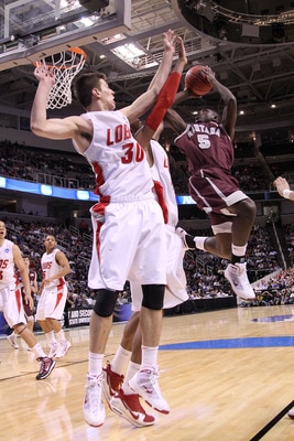 SAN JOSE, CA - MARCH 18: Guard Will Cherry #5 of the Montana Grizzlies goes up for a shot against the New Mexico Lobos during the first round of the 2010 NCAA men's basketball tournament at HP Pavilion on March 18, 2010 in San Jose, California. (Photo b