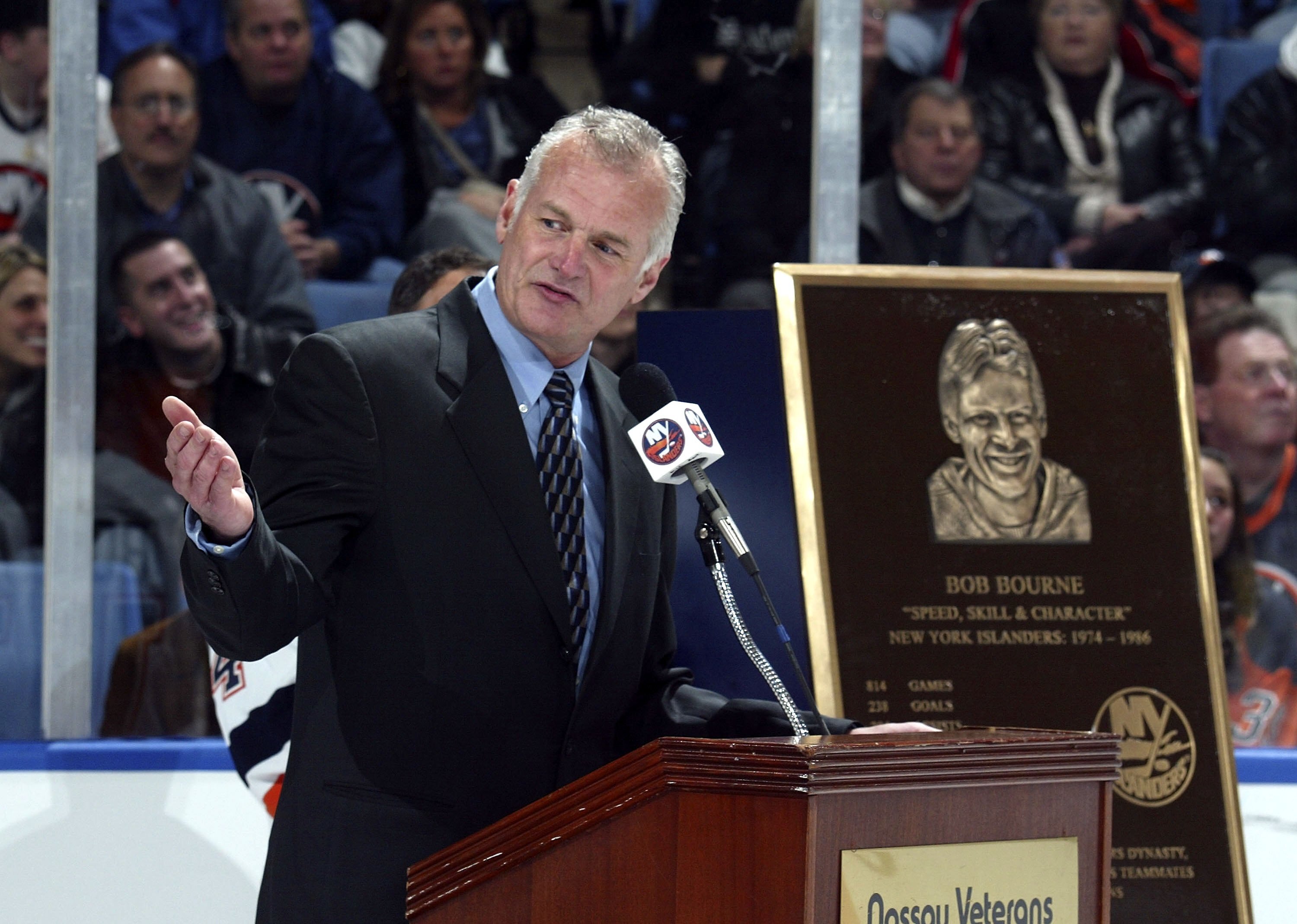 UNIONDALE, NY - NOVEMBER 25:  Former player Bob Bourne speaks to the crowd while being inducted to the New York Islanders Hall of Fame prior to the Islanders game against the Washington Capitals on November 25, 2006 at the Nassau Coliseum in Uniondale, Ne
