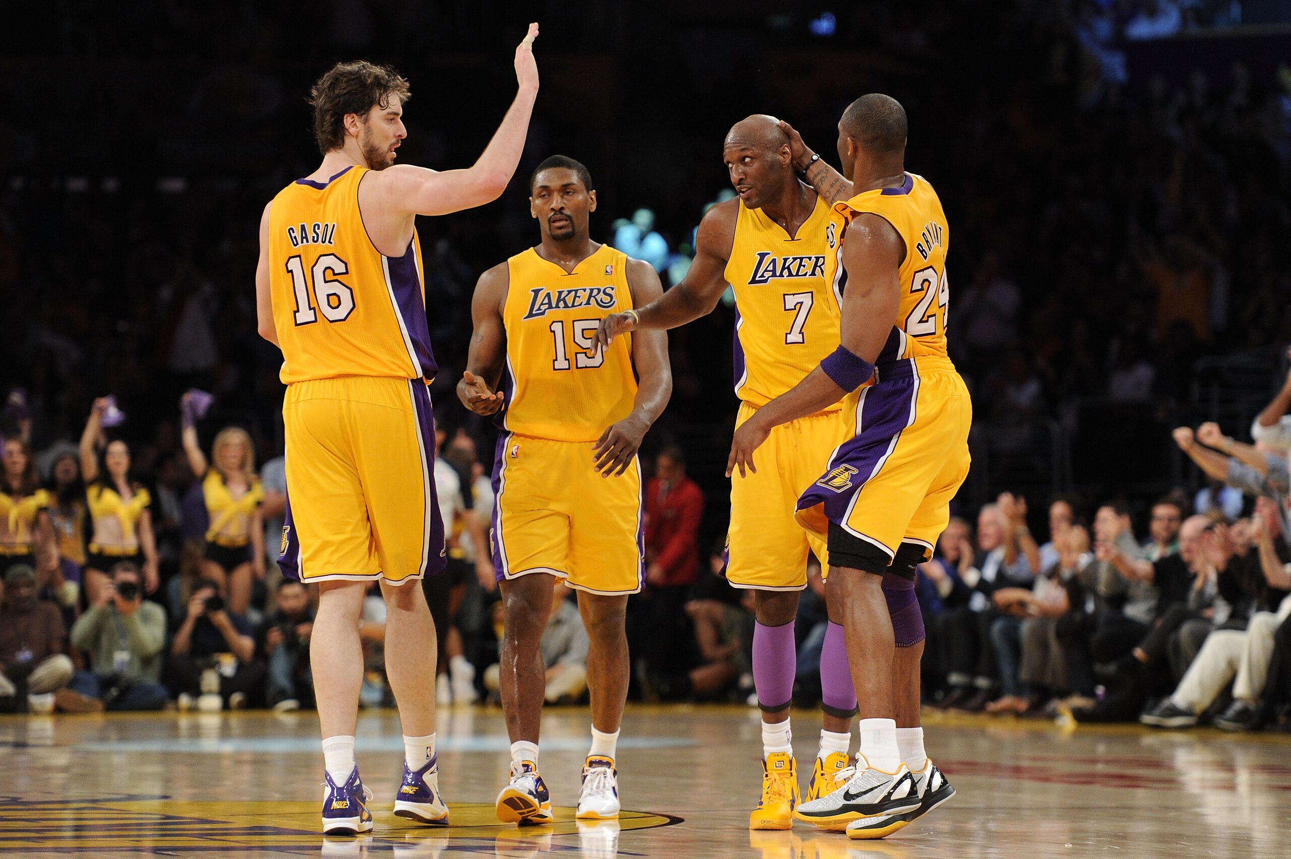 LOS ANGELES, CA - APRIL 20:  (L-R) Pau Gasol #16, Ron Artest #15, Lamar Odom #7 and Kobe Bryant #24 of the Los Angeles Lakers celebrate while taking on the New Orleans Hornets in Game Two of the Western Conference Quarterfinals in the 2011 NBA Playoffs on