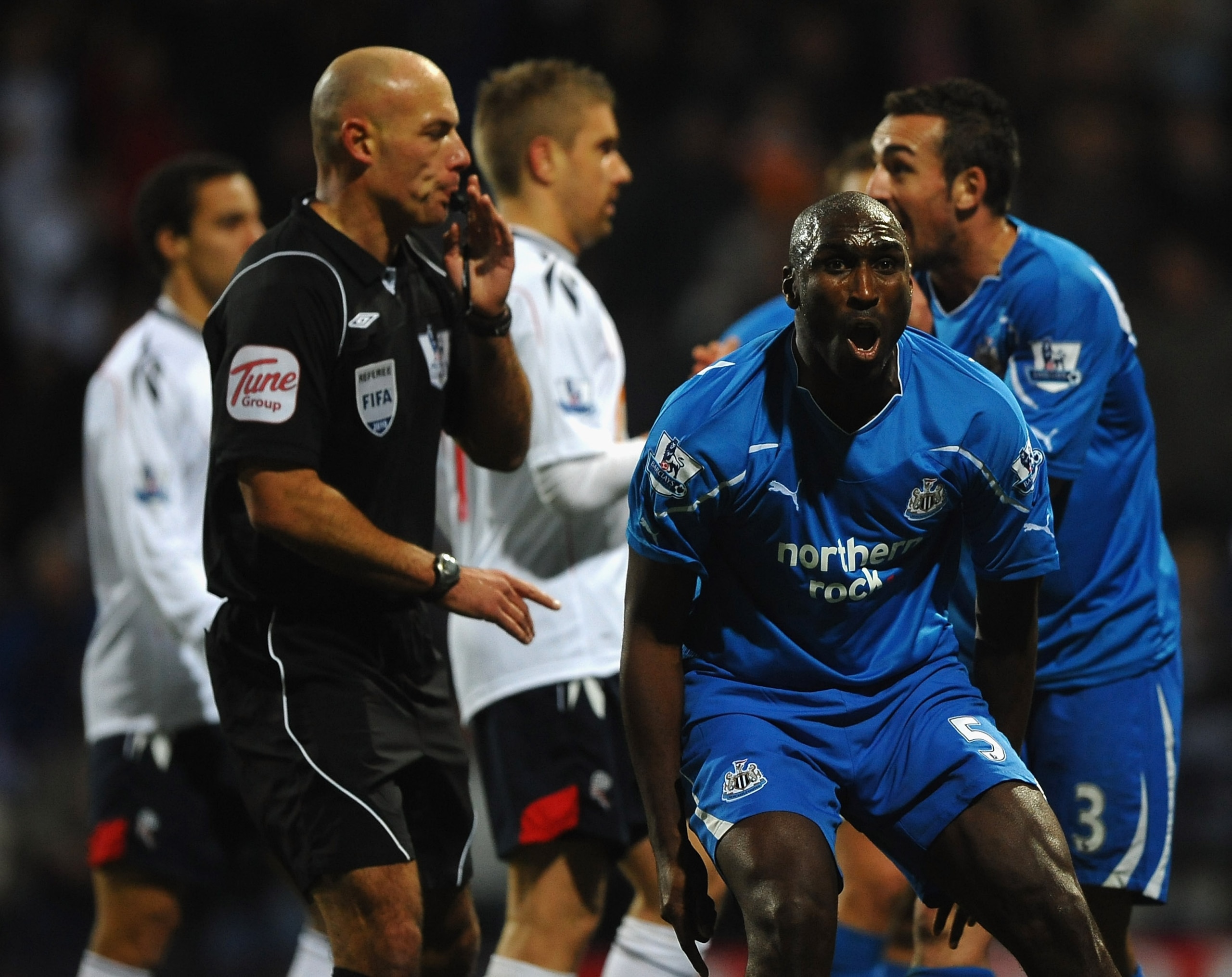 BOLTON, ENGLAND - NOVEMBER 20: Sol Campbell of Newcastle reacts to Referee Howard Webb as he awards a last minute penalty during the Barclays Premier League match between Bolton Wanderers and Newcastle United at the Reebok Stadium on November 20, 2010 in