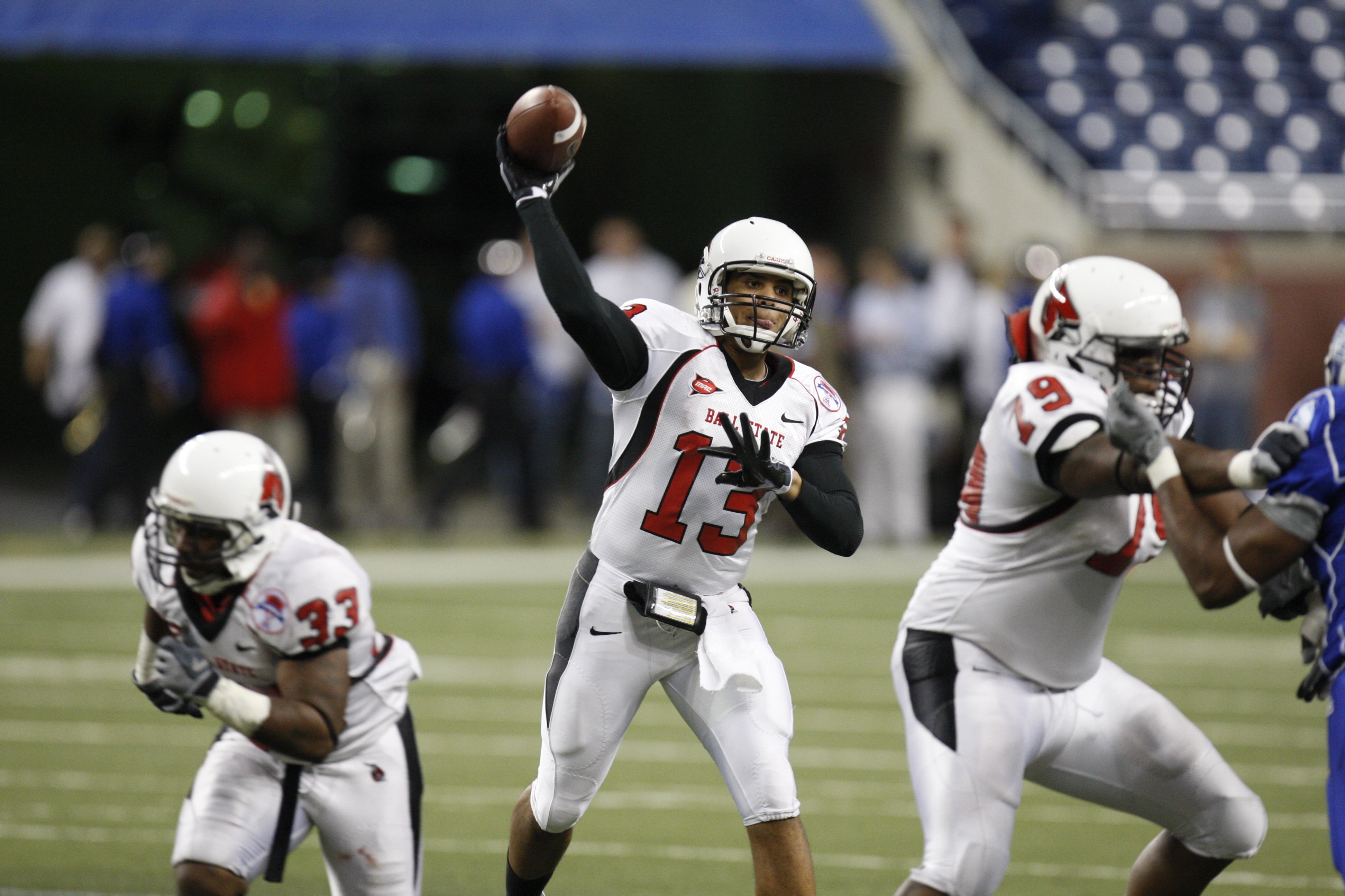 DETROIT - DECEMBER 5:  Quarterback Nate Davis #13 of the Ball State Cardinals throws a pass against the Buffalo Bulls during the MAC Championship game on December 5, 2008 at Ford Field in Detroit Michigan. (Photo by: Gregory Shamus/Getty Images)