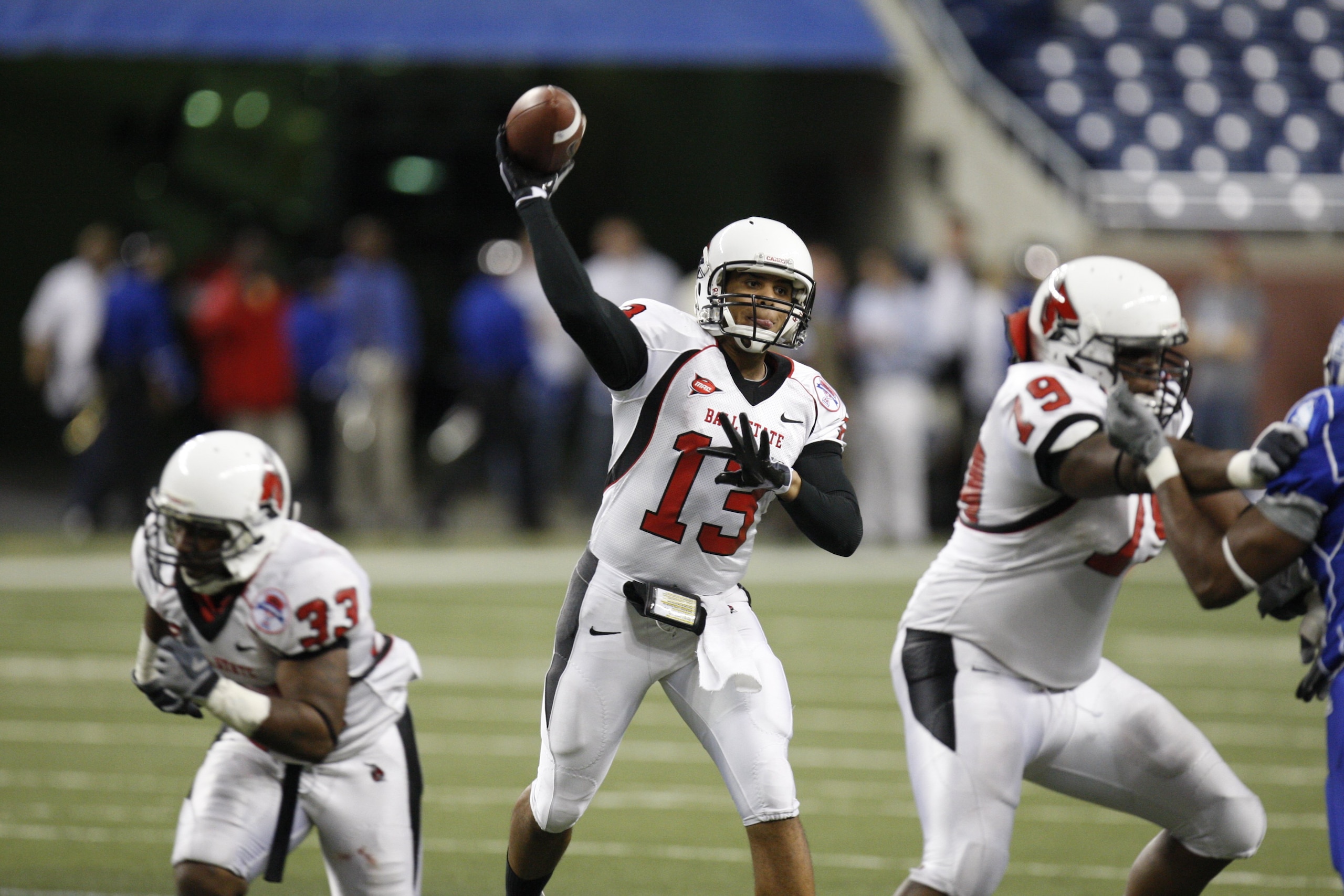 DETROIT - DECEMBER 5:  Quarterback Nate Davis #13 of the Ball State Cardinals throws a pass against the Buffalo Bulls during the MAC Championship game on December 5, 2008 at Ford Field in Detroit Michigan. (Photo by: Gregory Shamus/Getty Images)