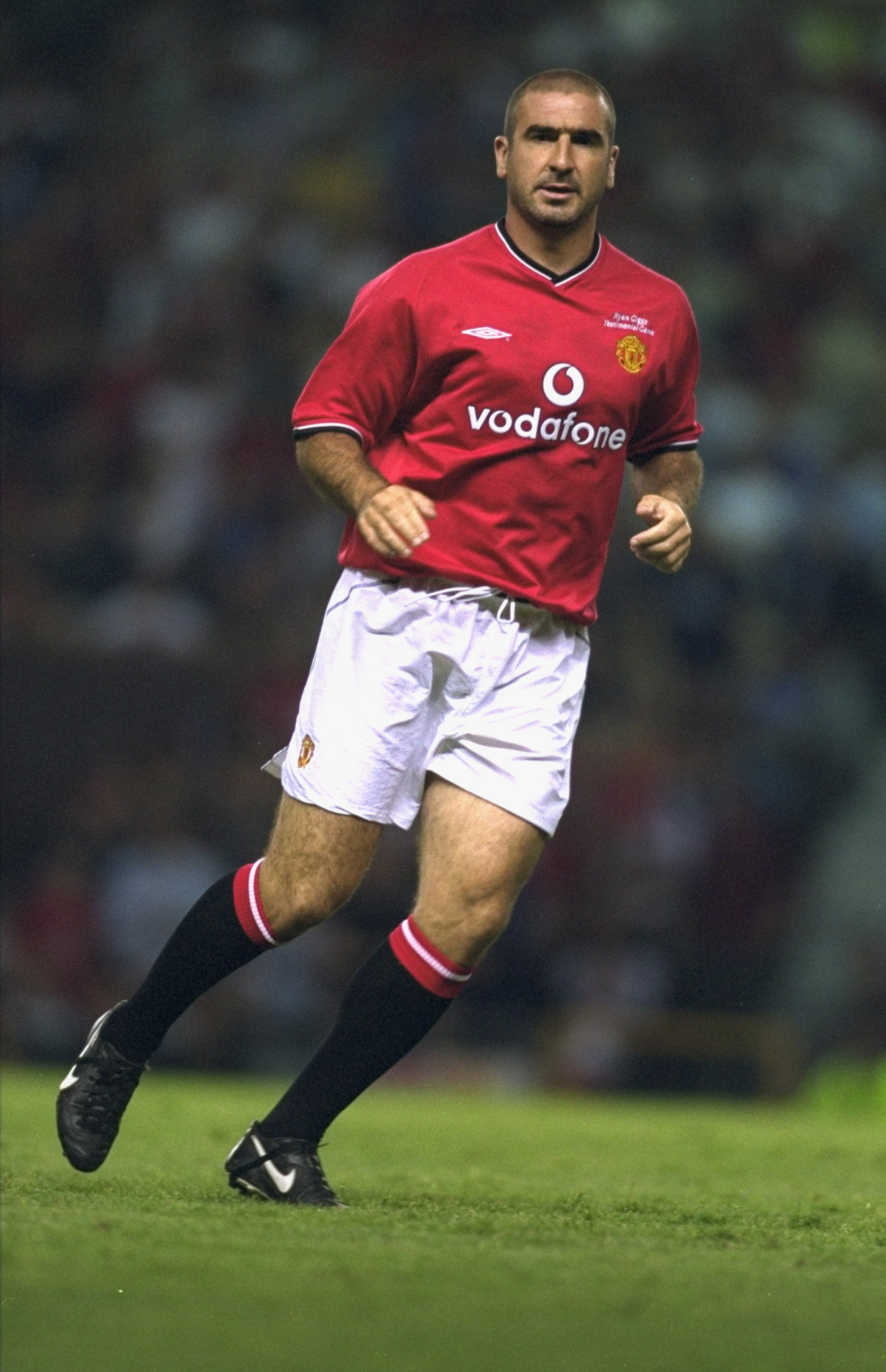 1 Aug 2001:  Eric Cantona makes a comeback in the Manchester United shirt during the Ryan Giggs Testimonial match against Celtic played at Old Trafford, in Manchester, England. Celtic won the match 4-3. \ Mandatory Credit: Gary M Prior /Allsport