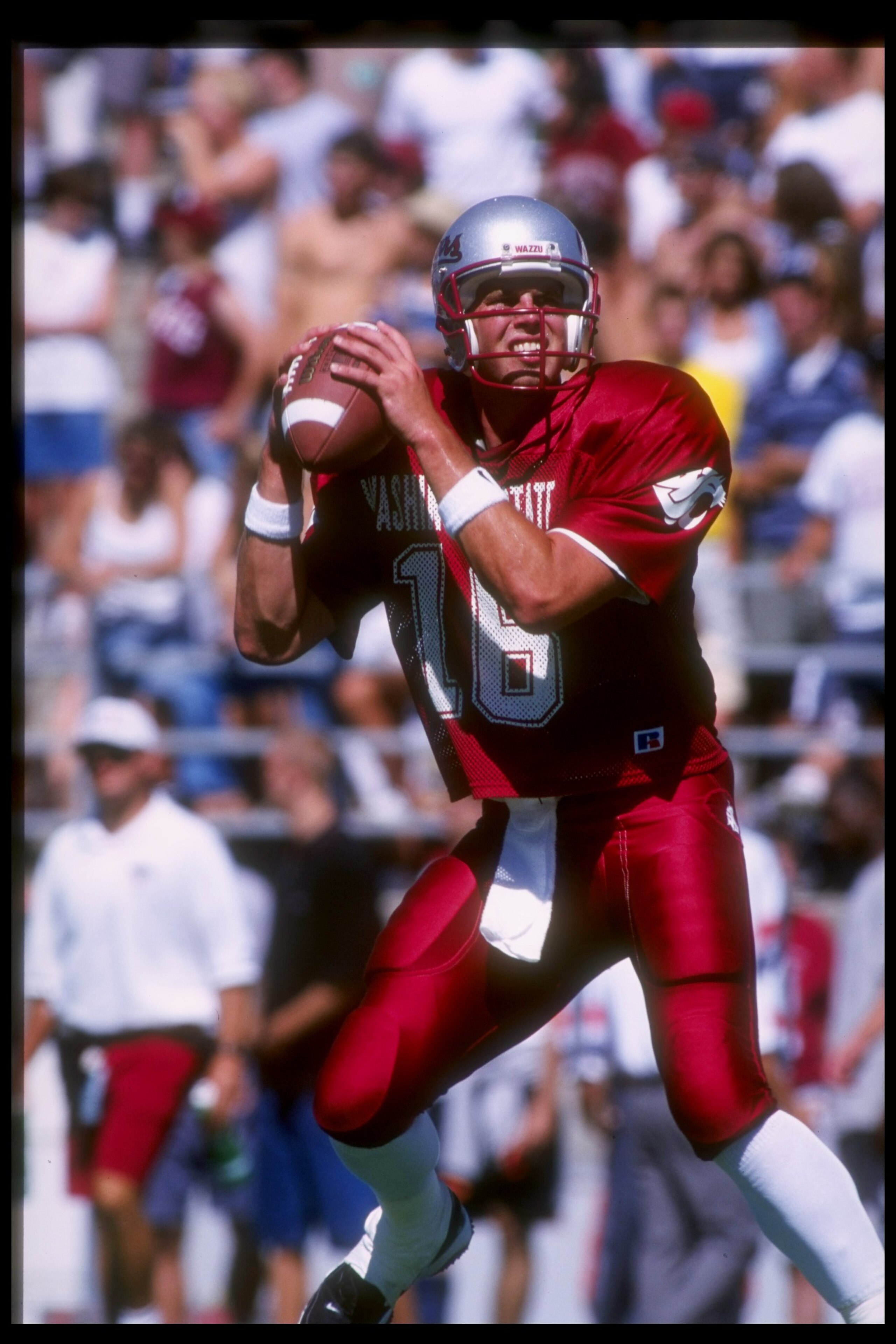 30 Aug 1997:  Quarterback Ryan Leaf #16 of Washington State drops back to pass during the Cougars 37-34 win over the UCLA Bruins at Clarence Martin Stadium in Pullman, Washington. Mandatory Credit: Otto Greule  /Allsport