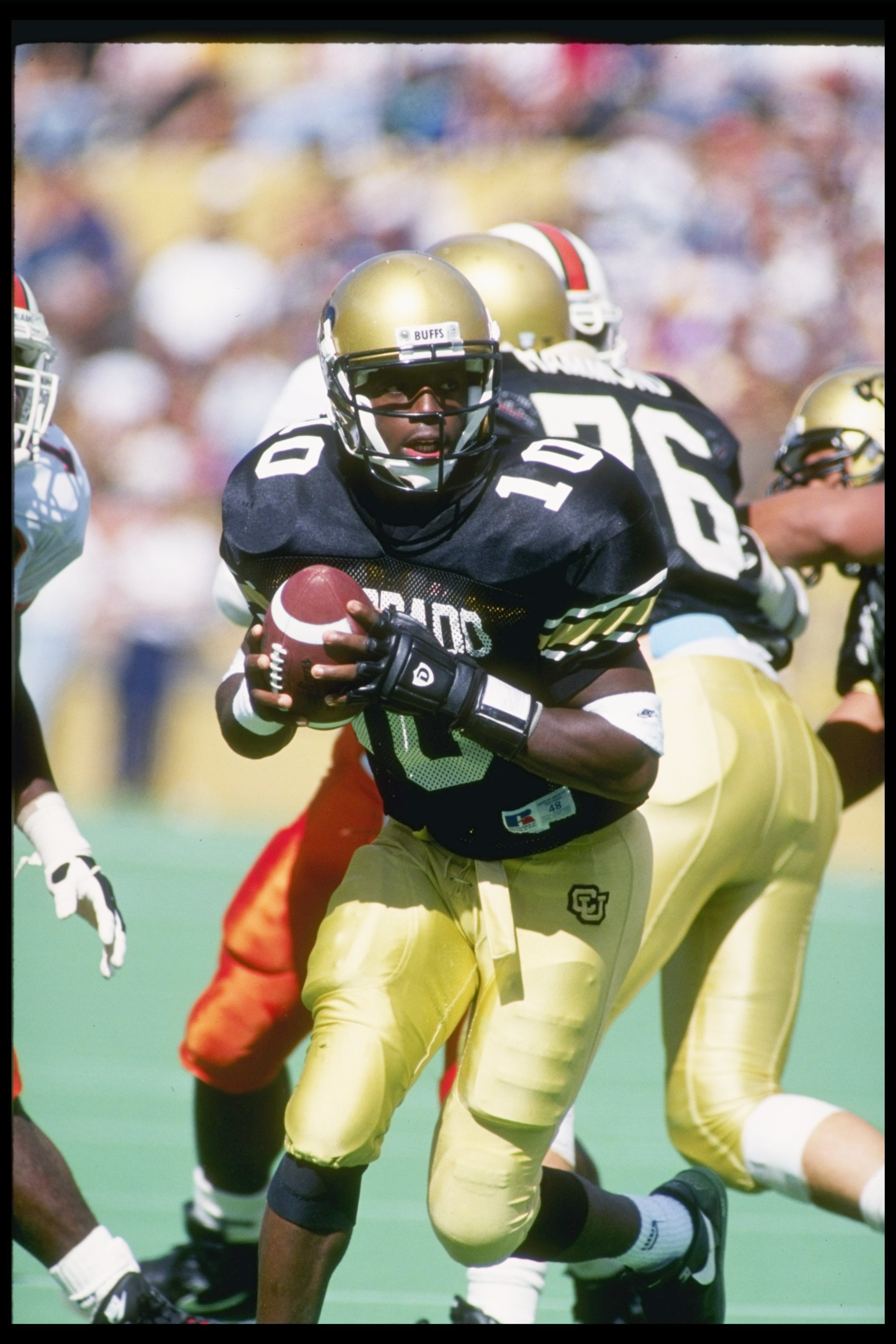 25 Sep 1993: Quarterback Kordell Stewart of the Colorado Buffaloes drops back during a game against the Miami Hurricanes at Folsom Field in Boulder, Colorado. Miami won the game 35-29.