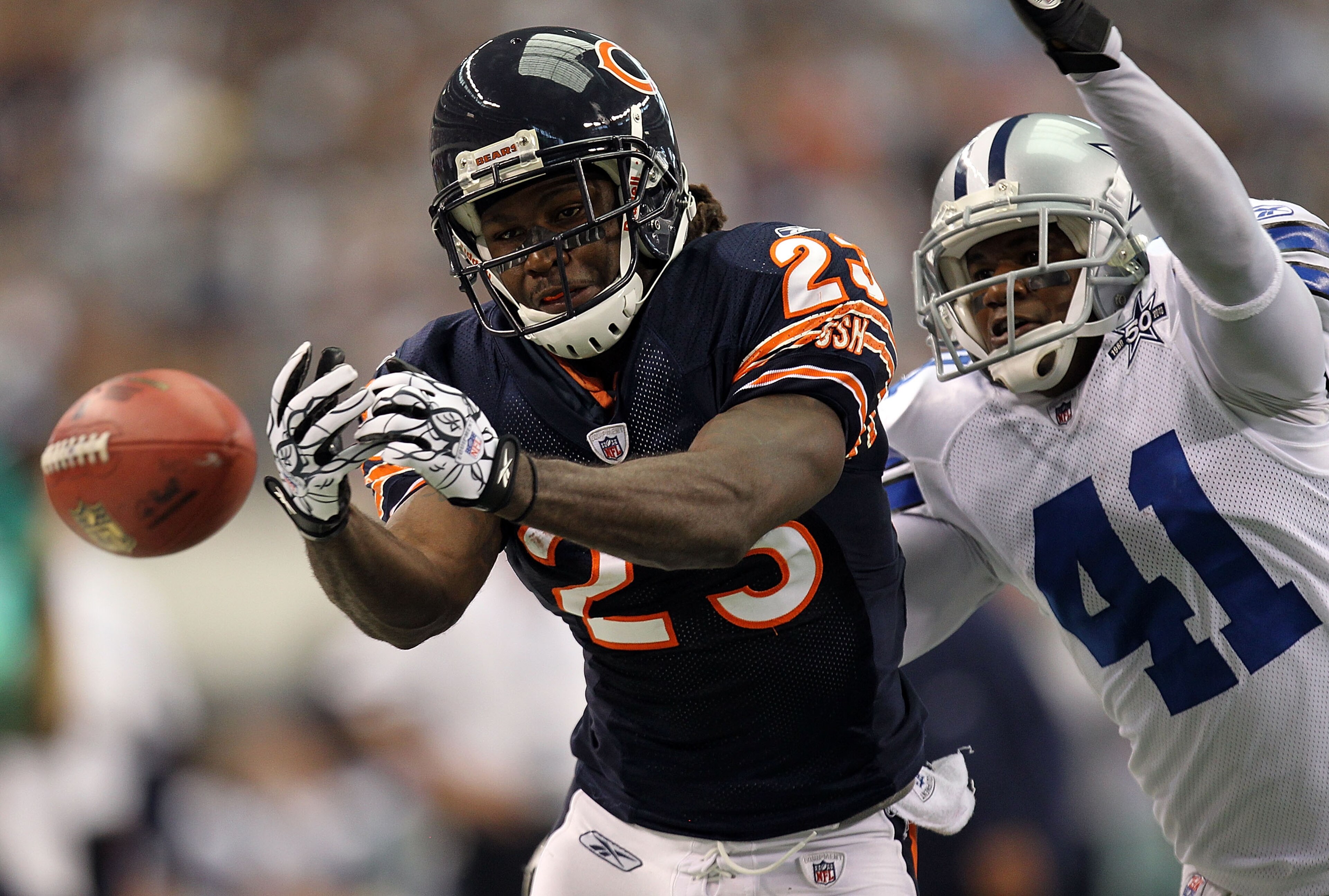 ARLINGTON, TX - SEPTEMBER 19: Wide receiver Devin Hester #23 of the Chicago Bears drops a pass in front of Terence Newman #41 of the Dallas Cowboys at Cowboys Stadium on September 19, 2010 in Arlington, Texas. (Photo by Ronald Martinez/Getty Images) ARLINGTON, TX - SEPTEMBER 19: Wide receiver Devin Hester #23 of the Chicago Bears drops a pass in front of Terence Newman #41 of the Dallas Cowboys at Cowboys Stadium on September 19, 2010 in Arlington, Texas. (Photo by Ronald Martinez/Getty Images)
