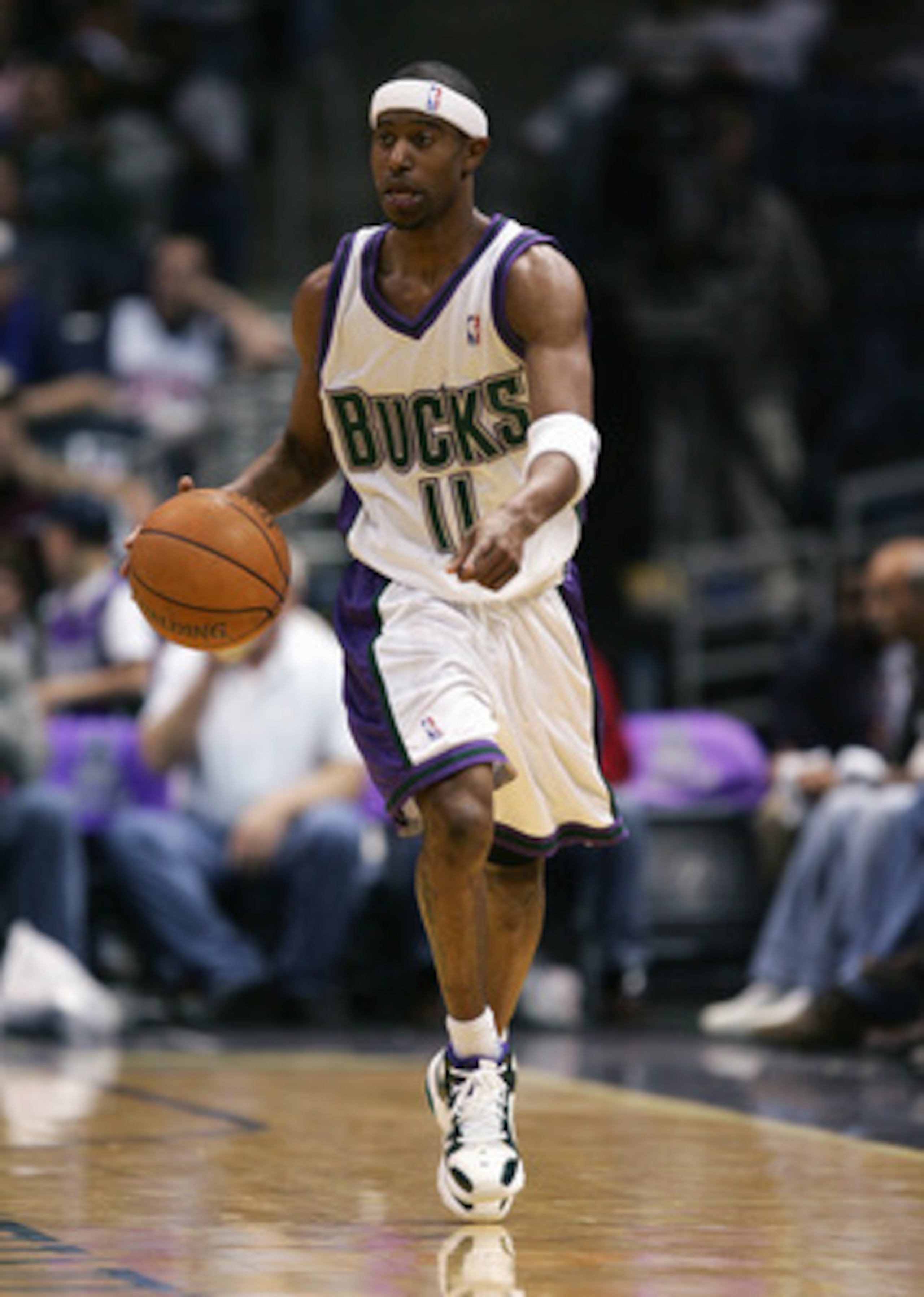 MILWAUKEE - APRIL 29:  T.J. Ford #11 of the Milwaukee Bucks moves the ball in game three of the Eastern Conference Quarterfinals against the Detroit Pistons during the 2006 NBA Playoffs on April 27, 2006 at the Bradley Center in Milwaukee, Wisconsin. The