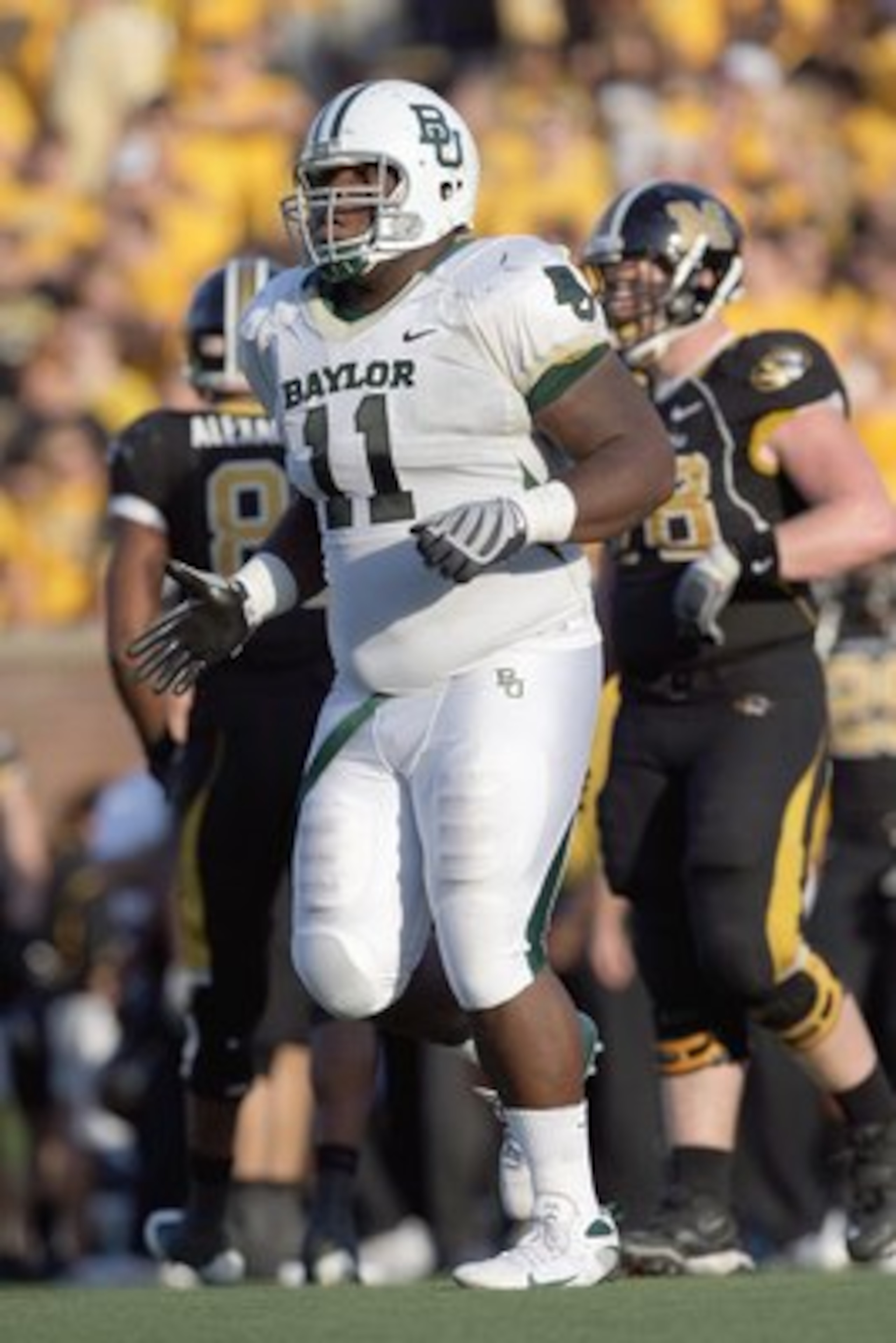COLUMBIA, MO - NOVEMBER 7: Phil Taylor #11 of the Baylor Bears moves on the field during the game against the Missouri Tigers at Faurot Field at Memorial Stadium on November 7, 2009 in Columbia, Missouri. (Photo by Jamie Squire/Getty Images) COLUMBIA, MO - NOVEMBER 7: Phil Taylor #11 of the Baylor Bears moves on the field during the game against the Missouri Tigers at Faurot Field at Memorial Stadium on November 7, 2009 in Columbia, Missouri. (Photo by Jamie Squire/Getty Images)