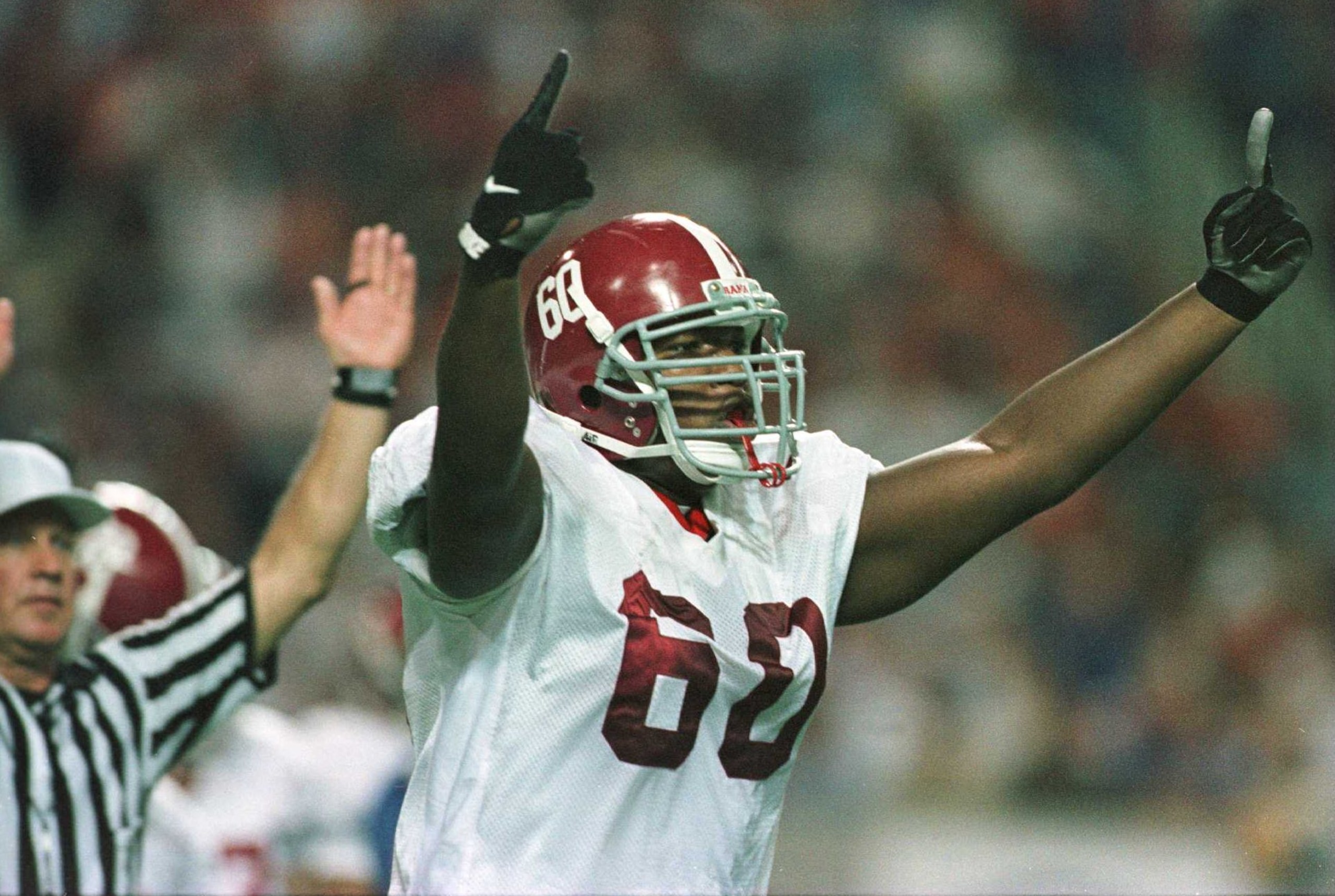 7 Dec 1996:  Chris Samuels #60 of Alabama celebrates a touchdown against Florida during the first half of the SEC Championship at the Georgia Dome in Atlanta, Georgia. Mandatory Credit: Andy Lyons/Allsport