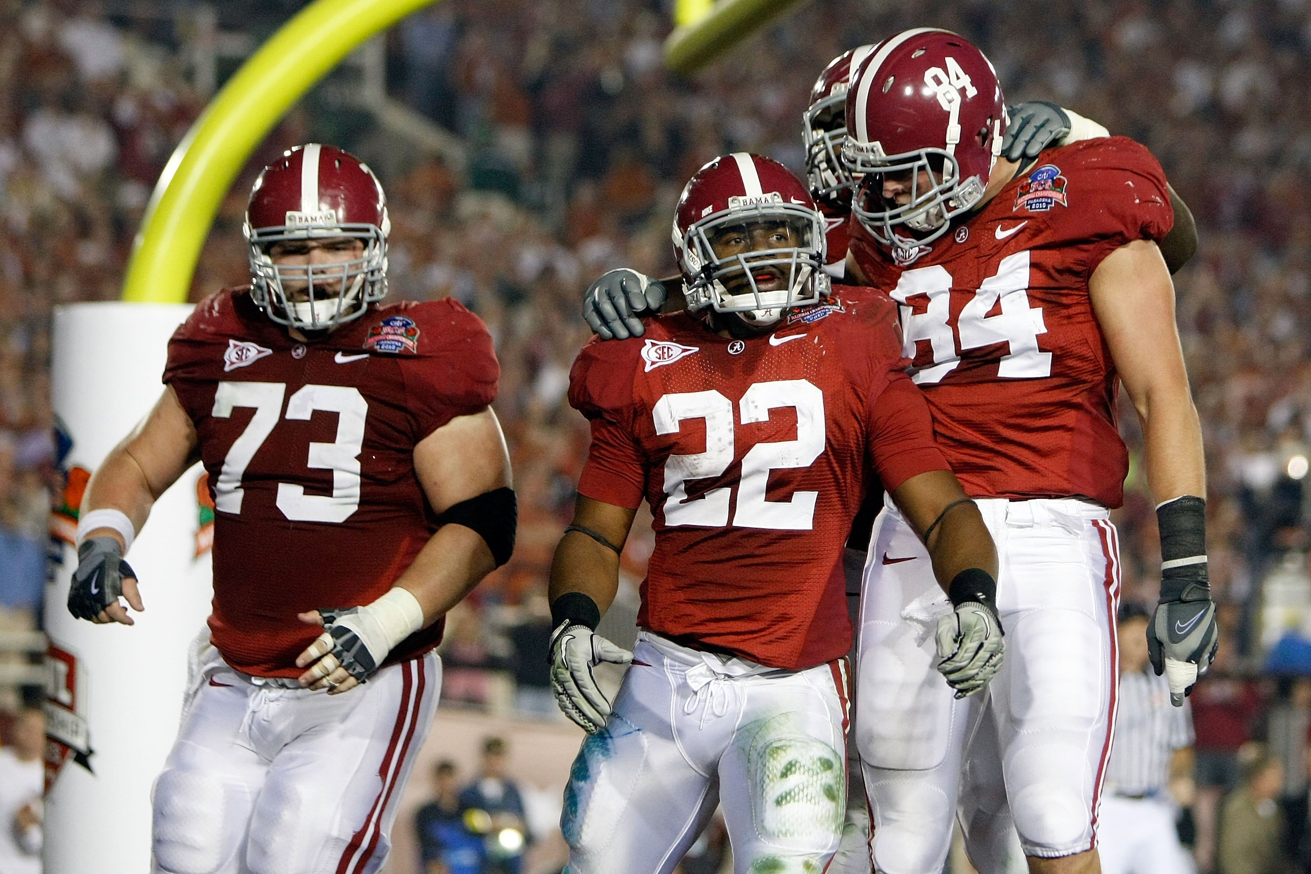 PASADENA, CA - JANUARY 07:  Running back Mark Ingram #22 of the Alabama Crimson Tide celebrates a touchdown against the Texas Longhorns with his teammates in the second quarter of the Citi BCS National Championship game at the Rose Bowl on January 7, 2010