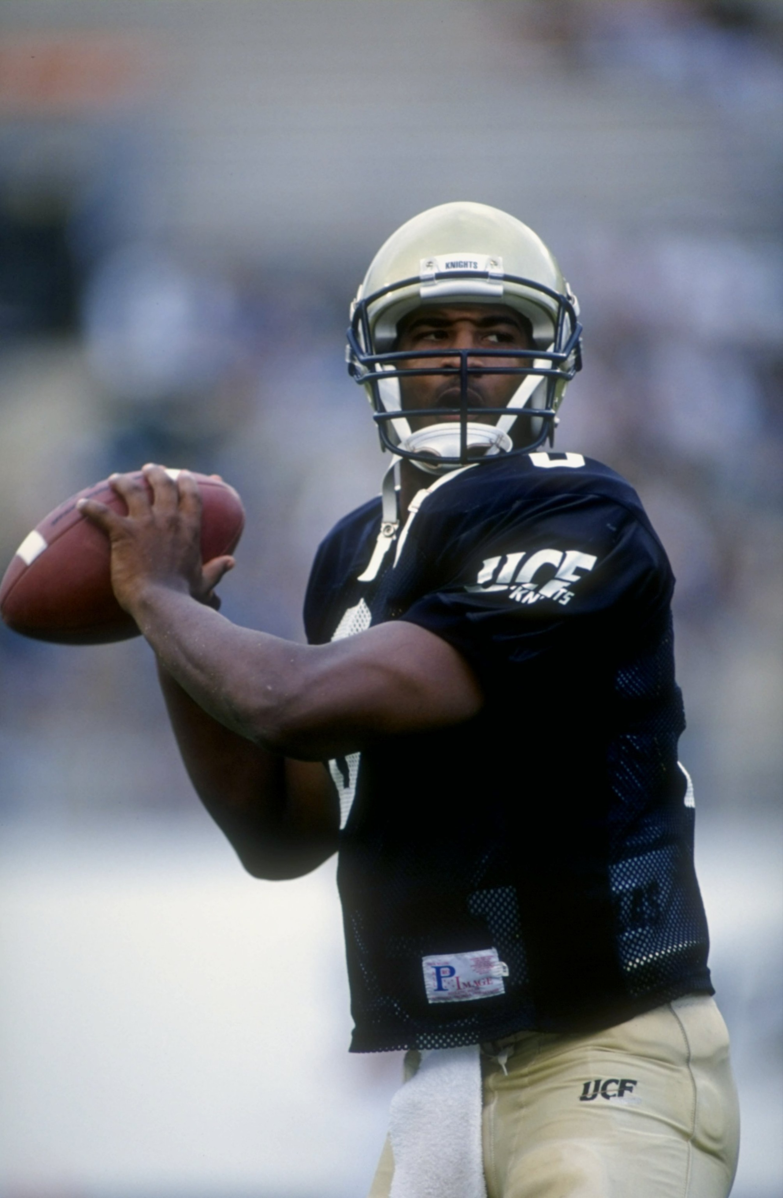 11 Oct 1997: Daunte Culpepper #8 of the Central Florida Golden Knights looks to throw during the game against the Samford Bulldogs at Florida Citrus Bowl in Orlando, Florida. Central Florida defeated Samford 52-7. Mandatory Credit: Scott Halleran  /Allspo