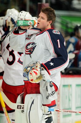 DENVER, CO - MARCH 22:  Goalie Steve Mason #1 of the Columbus Blue Jackets takes a drink during a break in the action against the Colorado Avalanche at the Pepsi Center on March 22, 2011 in Denver, Colorado. Mason collect the loss as the Avalanche defeate