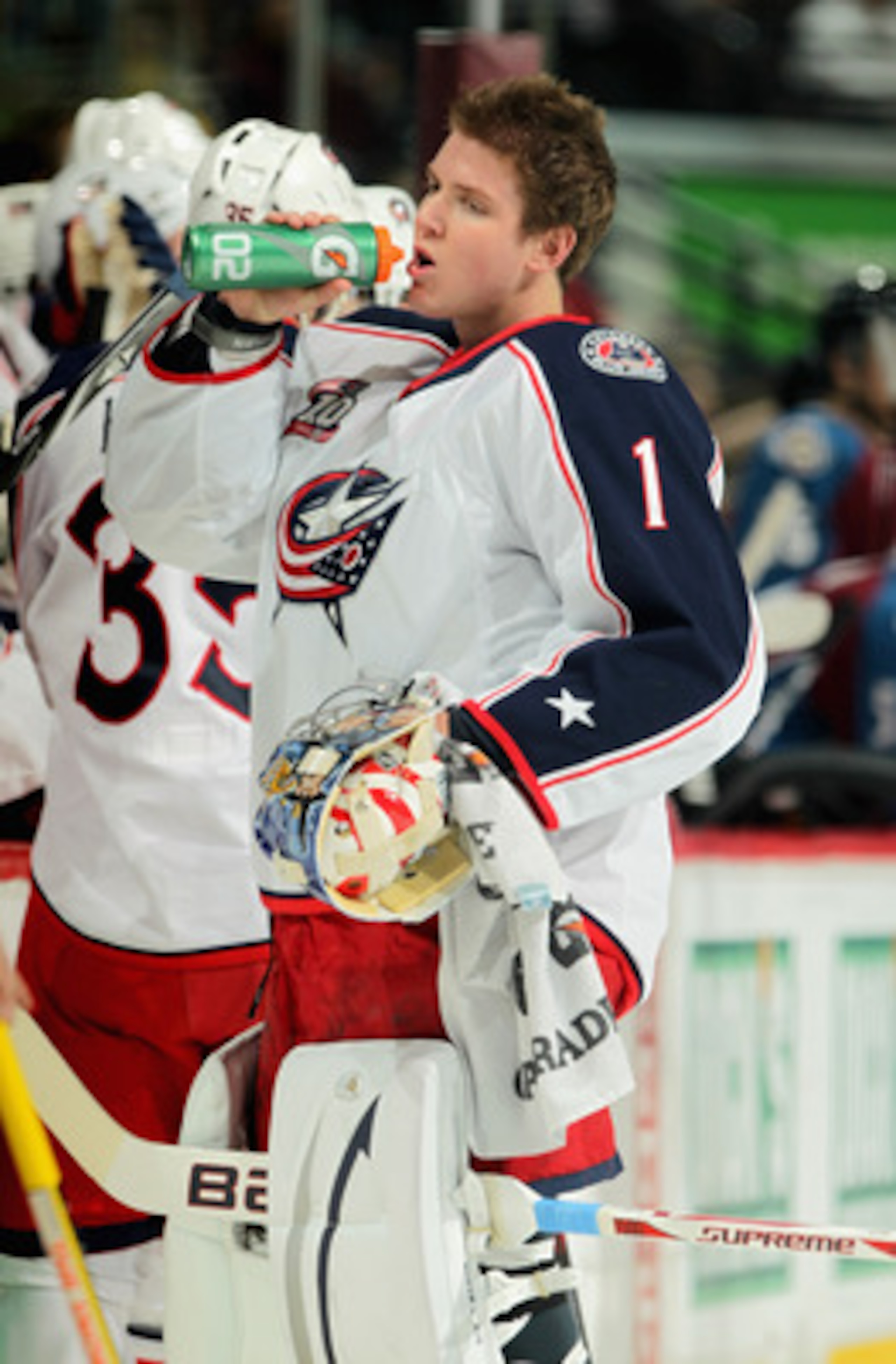 DENVER, CO - MARCH 22:  Goalie Steve Mason #1 of the Columbus Blue Jackets takes a drink during a break in the action against the Colorado Avalanche at the Pepsi Center on March 22, 2011 in Denver, Colorado. Mason collect the loss as the Avalanche defeate