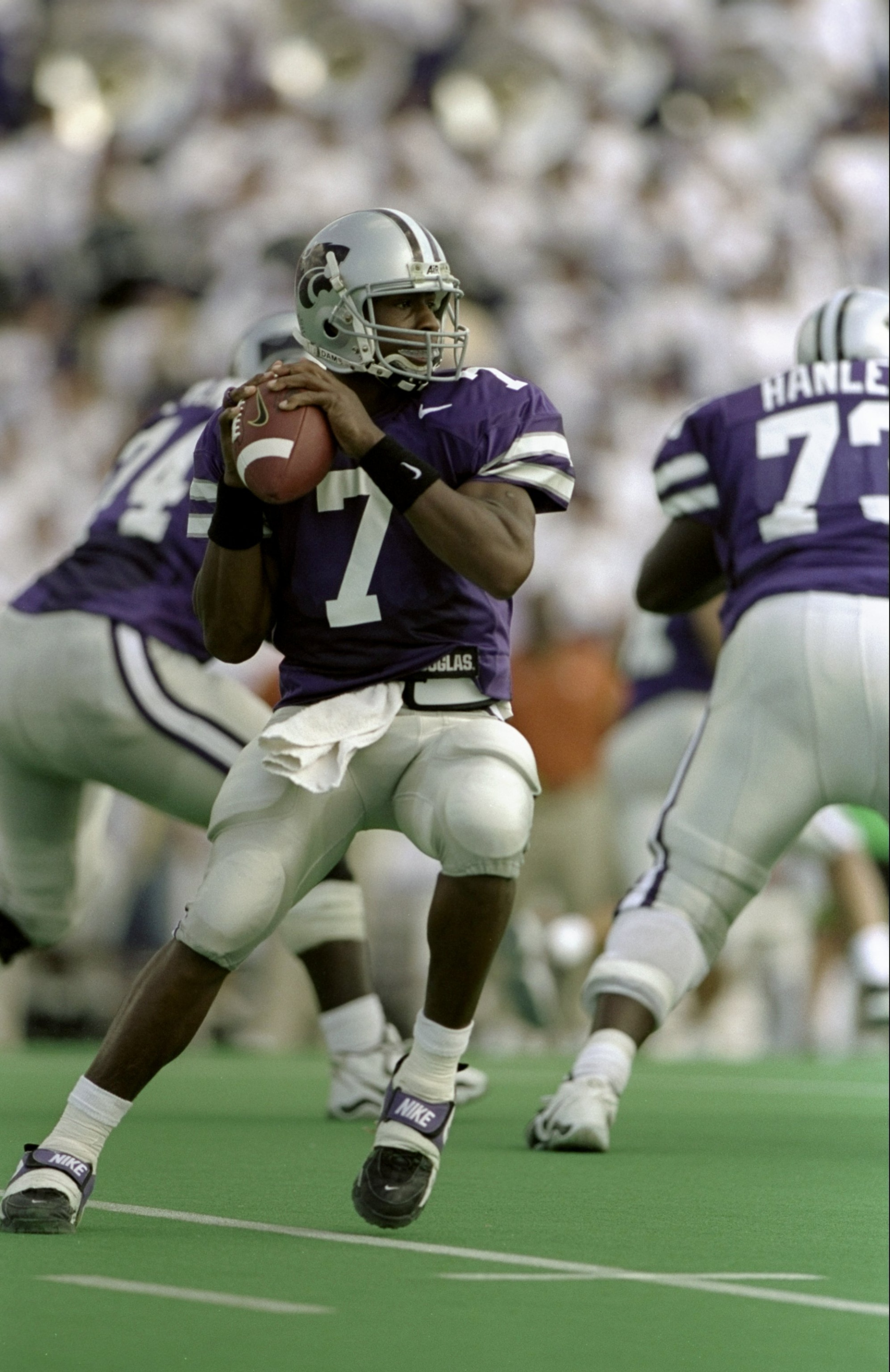 19 Sep 1998:  Quarterback Michael Bishop #7 of the Kansas State Wildcats drops back to pass during a game against the Texas Longhorns at the KSU Wagner Field in Manhattan, Kansas. The Wildcats defeated the Longhorns 48-7.