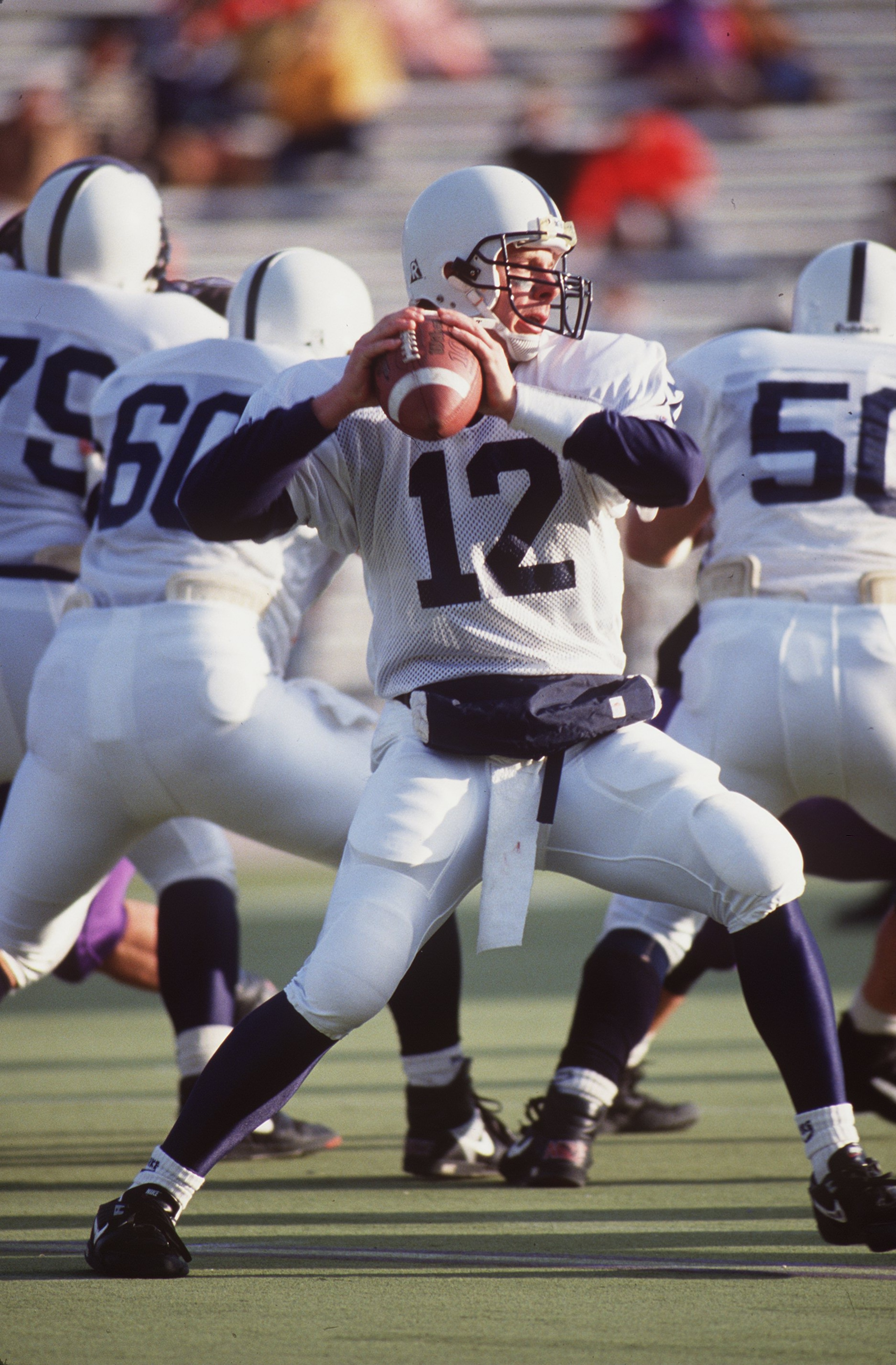 PENN STATE QUARTERBACK KERRY COLLINS LOOKS TO PASS.