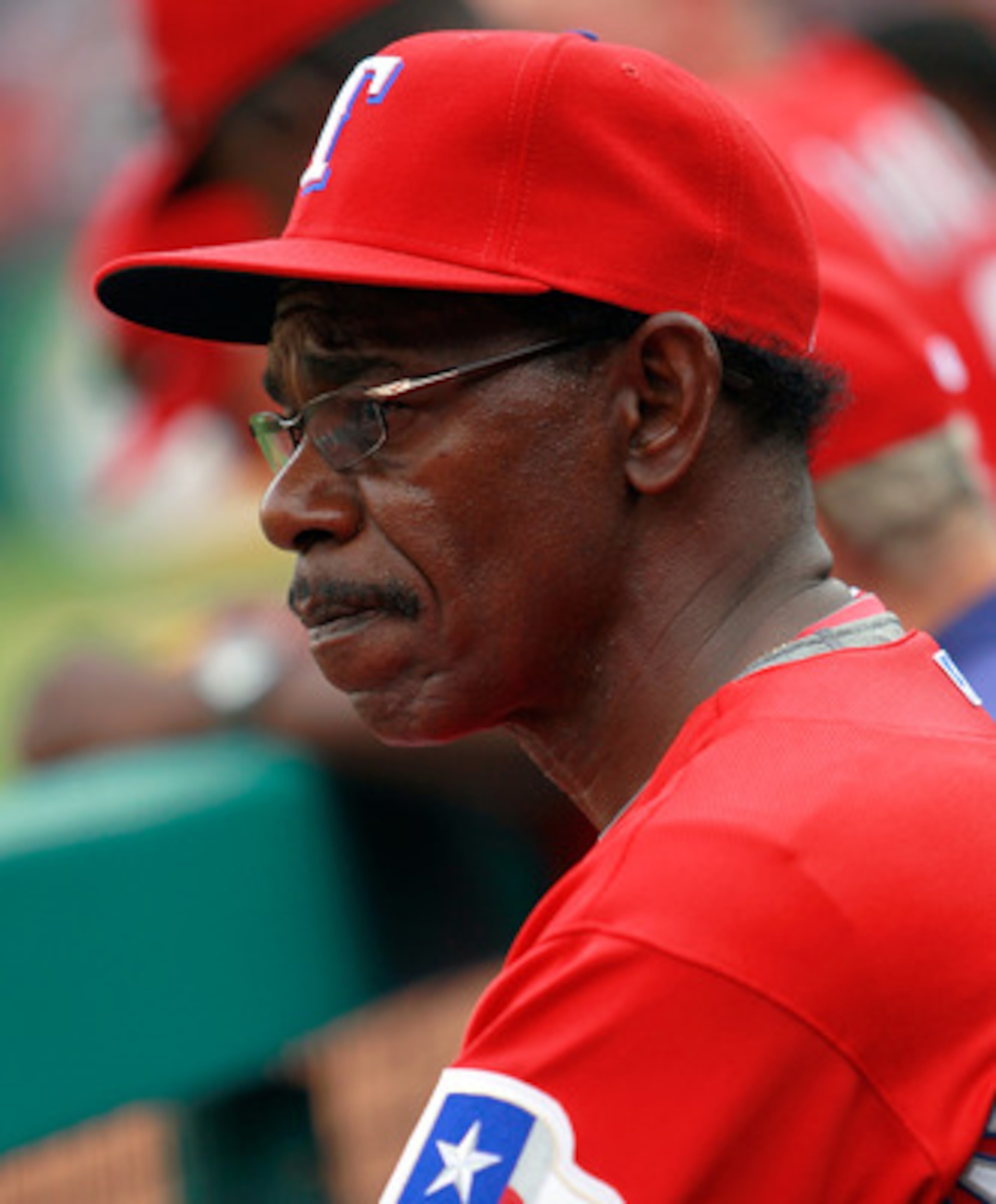 ARLINGTON, TX - APRIL 01:  Manager Ron Washington of the Texas Rangers leads his team against the Boston Red Sox on Opening Day at Rangers Ballpark in Arlington on April 1, 2011 in Arlington, Texas.  (Photo by Tom Pennington/Getty Images)