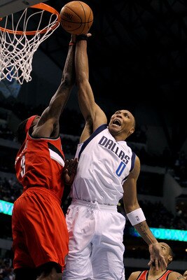DALLAS, TX - APRIL 16:  Forward Shawn Marion #0 of the Dallas Mavericks is fouled by Gerald Wallace #3 of the Portland Trail Blazers in Game One of the Western Conference Quarterfinals during the 2011 NBA Playoffs on April 16, 2011 at American Airlines Ce