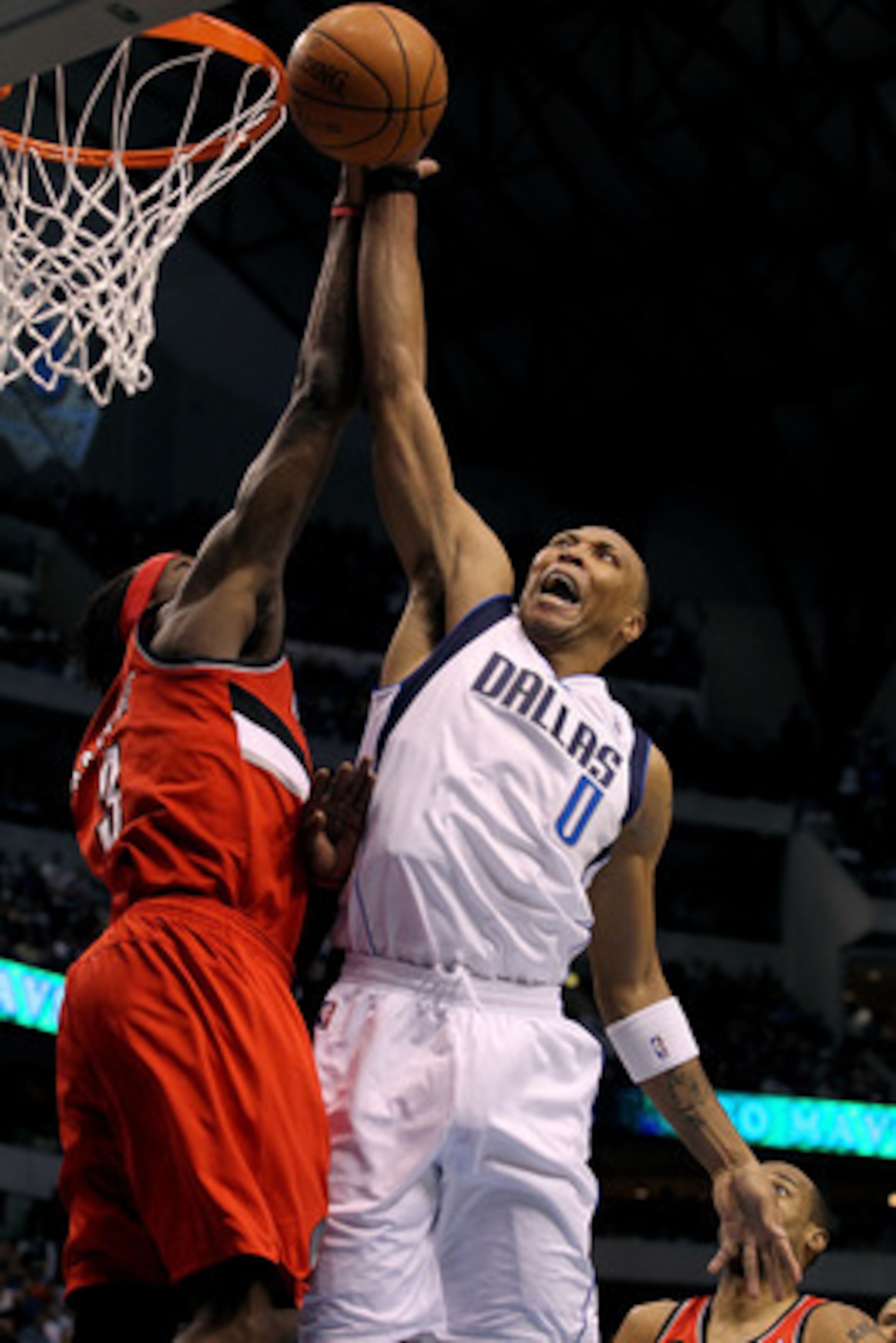 DALLAS, TX - APRIL 16:  Forward Shawn Marion #0 of the Dallas Mavericks is fouled by Gerald Wallace #3 of the Portland Trail Blazers in Game One of the Western Conference Quarterfinals during the 2011 NBA Playoffs on April 16, 2011 at American Airlines Ce