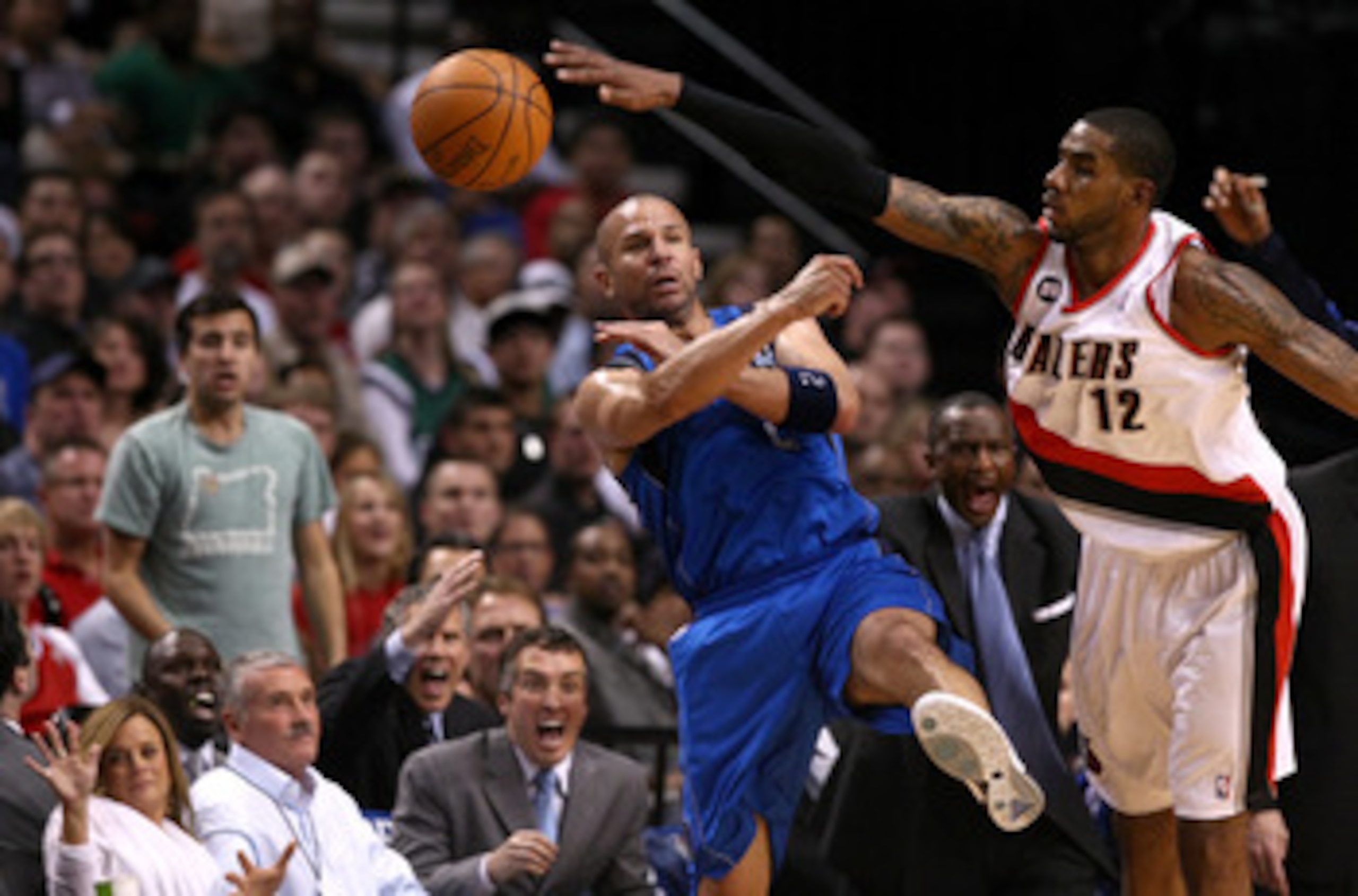 PORTLAND, OR - APRIL 23:  LaMarcus Aldridge #12 of the Portland Trail Blazers defends Jason Kidd #2 of the Dallas Mavericks in Game Four of the Western Conference Quarterfinals in the 2011 NBA Playoffs on April 23, 2011 at the Rose Garden in Portland, Ore