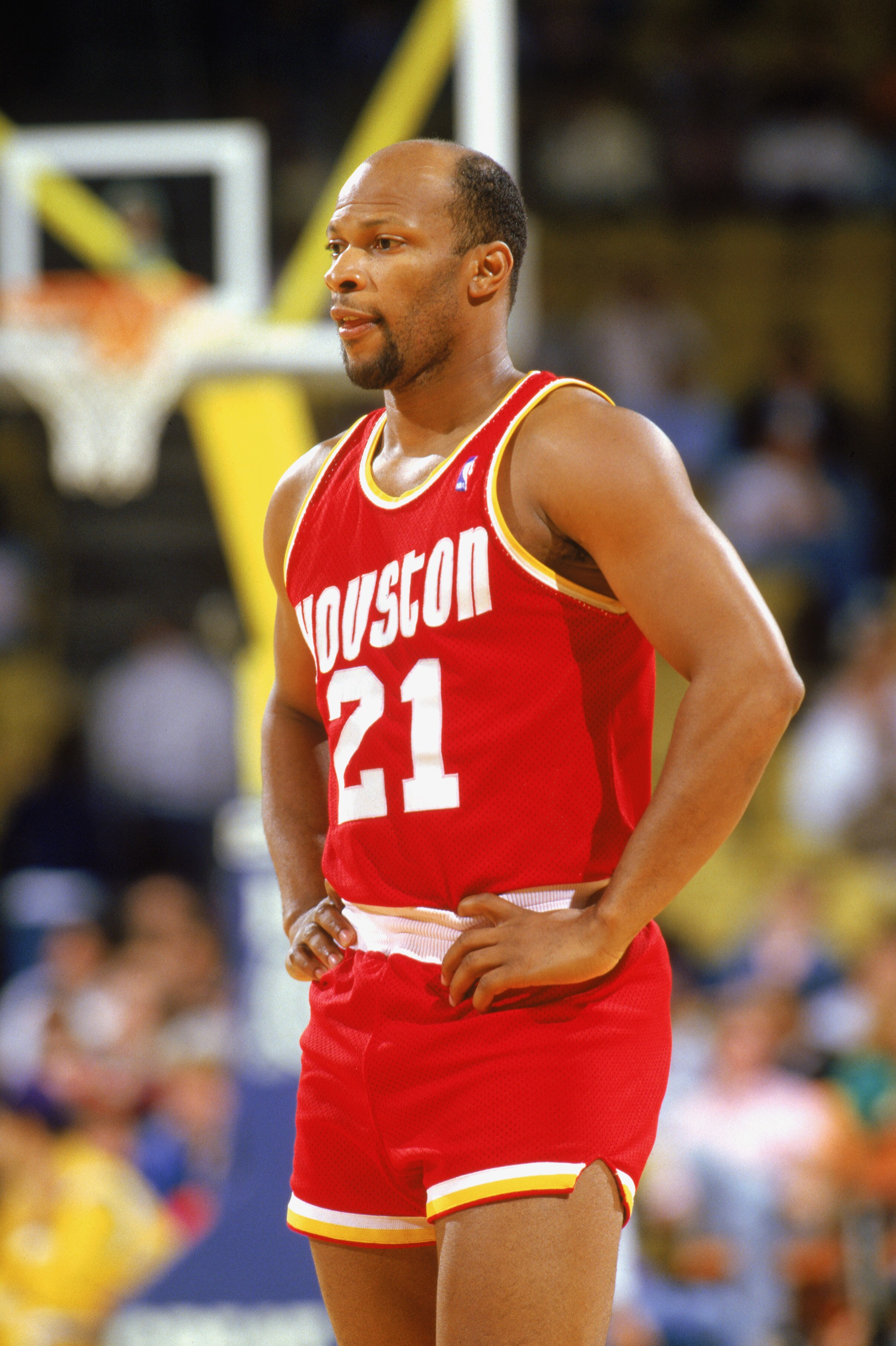 INGLEWOOD - 1987:  World B. Free #21 of the Houston Rockets waits during a game in the1987-88 season against the Los Angeles Lakers at the Forum in Inglewood, California. NOTE TO USER: User expressly acknowledges and agrees that, by downloading and/or usi