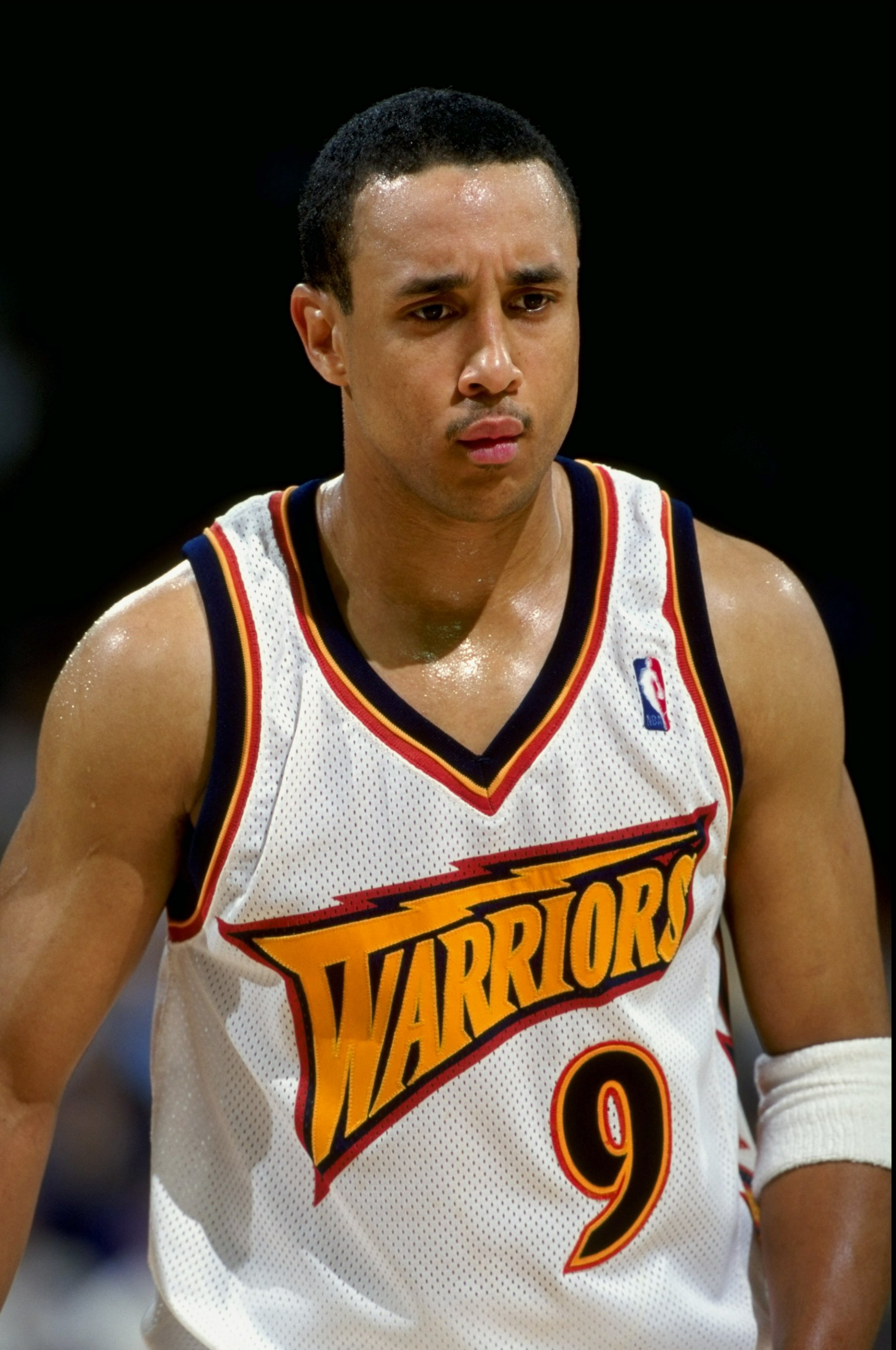 15 Feb 1999:  John Starks #9 of the Golden State Warriors looking on during the game against the Minnesota Timberwolves at the Oakland Arena in Oakland, California. The Warriors defeated the Timberwolves 101-99.  Mandatory Credit: Todd Warshaw  /Allsport