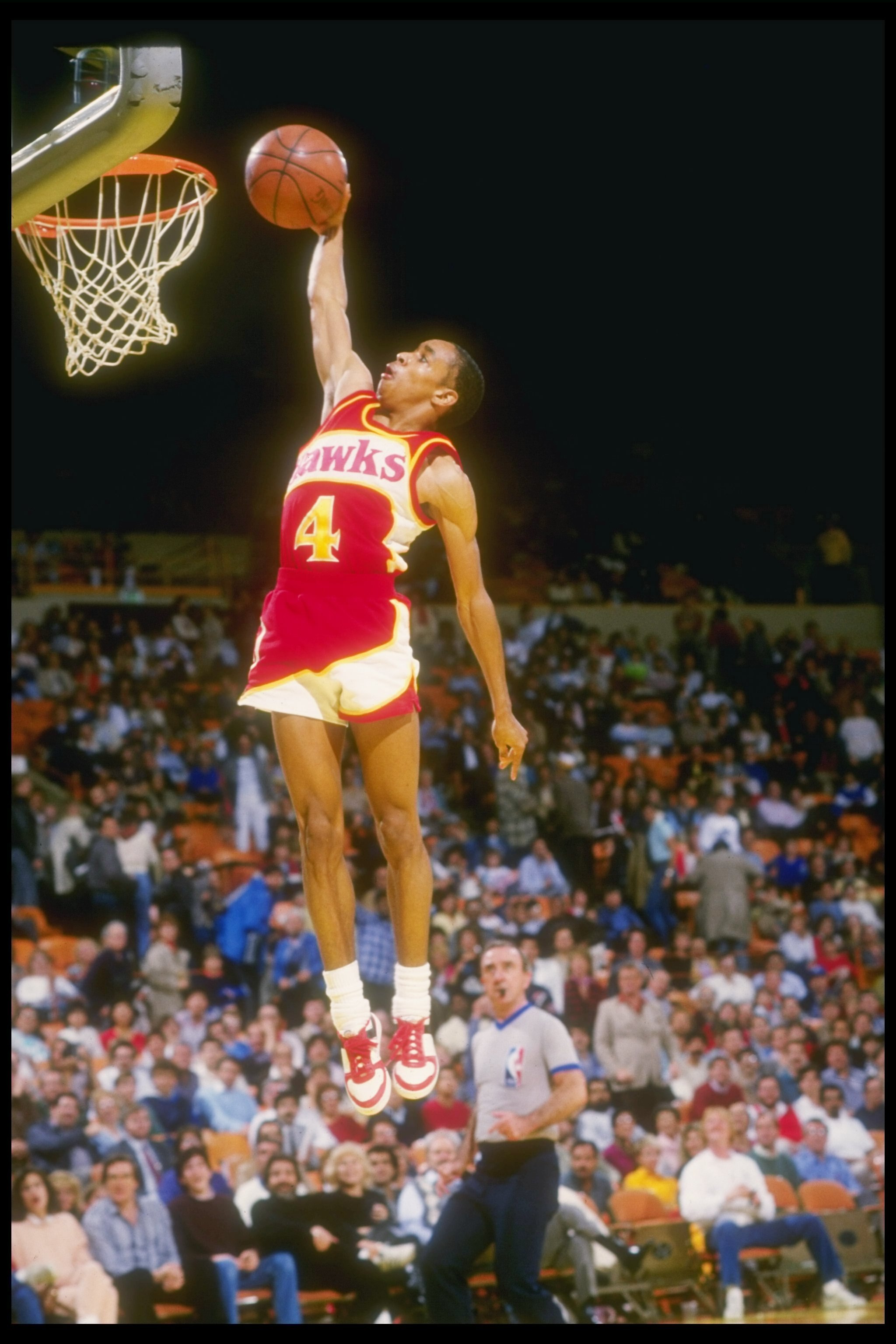 1986-1987:  Guard Anthony (Spud) Webb of the Atlanta Hawks         leaps to victory during a game against the Los Angeles Lakers at The Forum in Inglewood, California. Mandatory Credit: Stephen Dunn  /Allsport