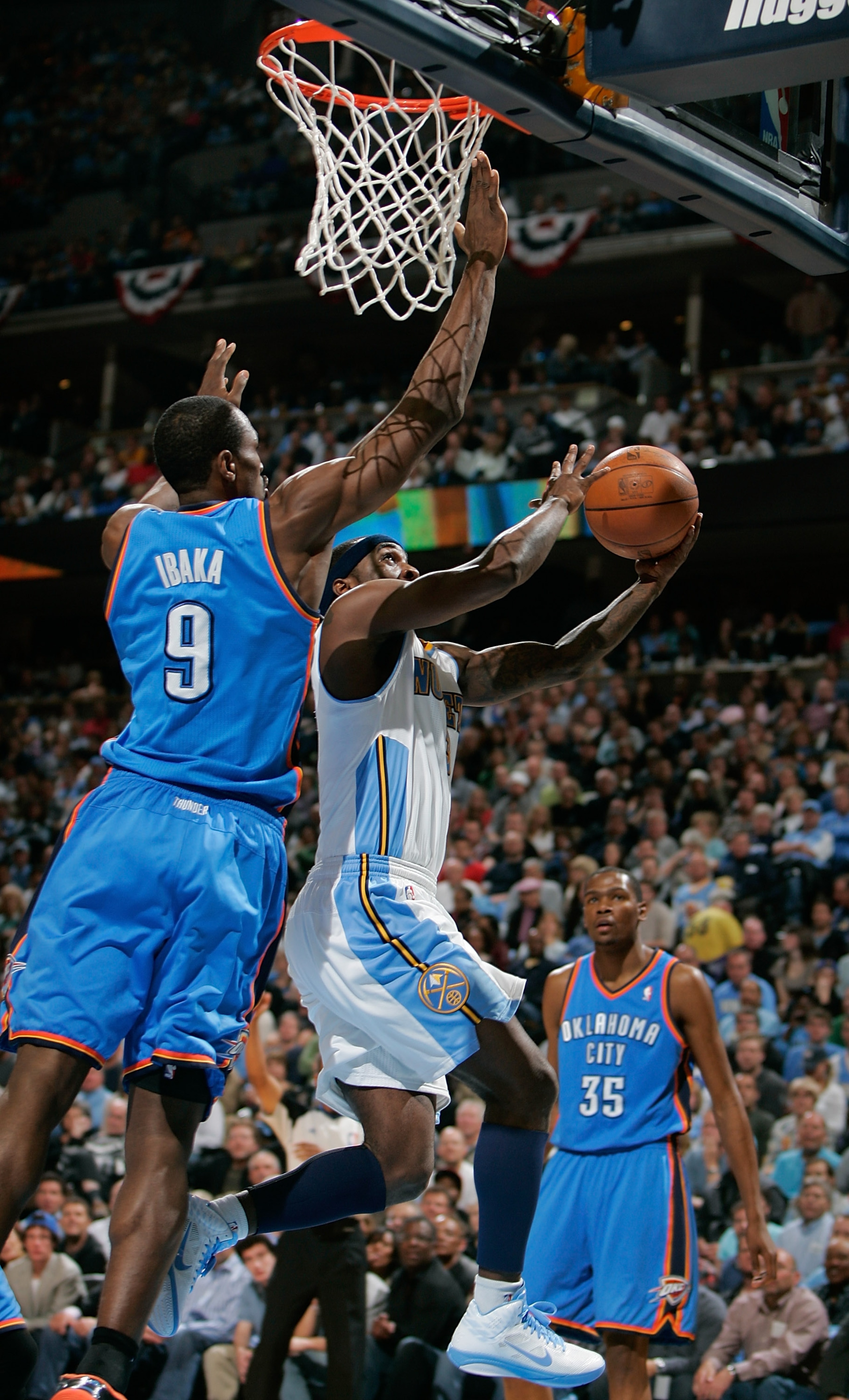 DENVER, CO - APRIL 23:  Ty Lawson #3 of the Denver Nuggets goes up for a shot against Serge Ibaka #9 of the Oklahoma City Thunder in Game Three of the Western Conference Quarterfinals in the 2011 NBA Playoffs at Pepsi Center on April 23, 2011 in Denver, C