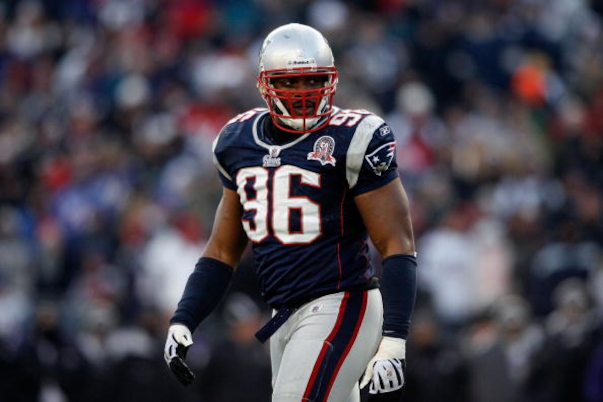 FOXBORO, MA - JANUARY 10:  Adalius Thomas #96 of the New England Patriots looks on against the Baltimore Ravens during the 2010 AFC wild-card playoff game at Gillette Stadium on January 10, 2010 in Foxboro, Massachusetts. The Ravens won 33-14. (Photo by E