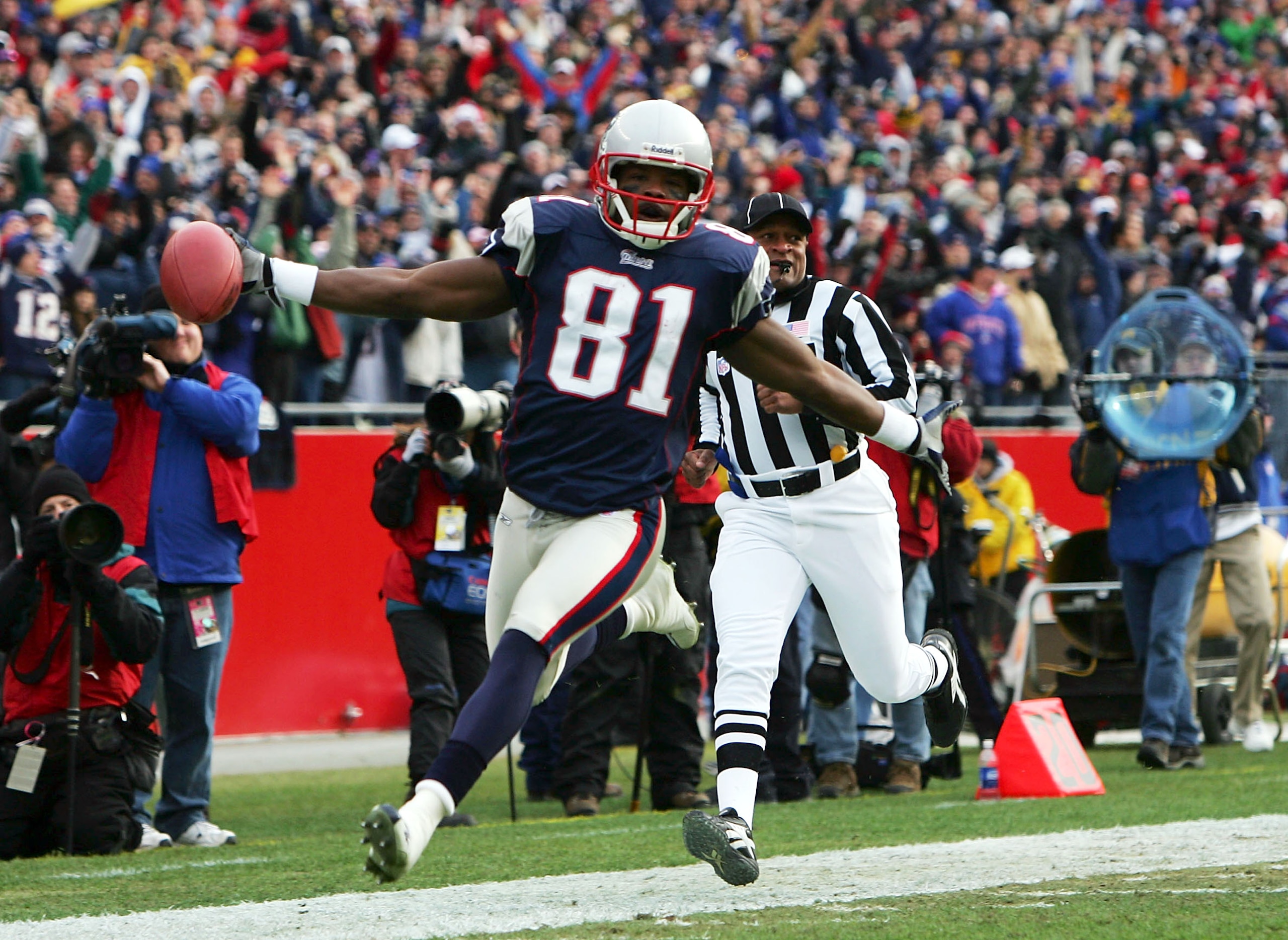 FOXBORO, MA - JANUARY 2:  Bethel Johnson #81 of the New England Patriots celebrates a punt return touchdown which was called back due to a penalty in the first quarter against the San Francisco 49ers during their game on January 2, 2005 at Gillette Stadiu