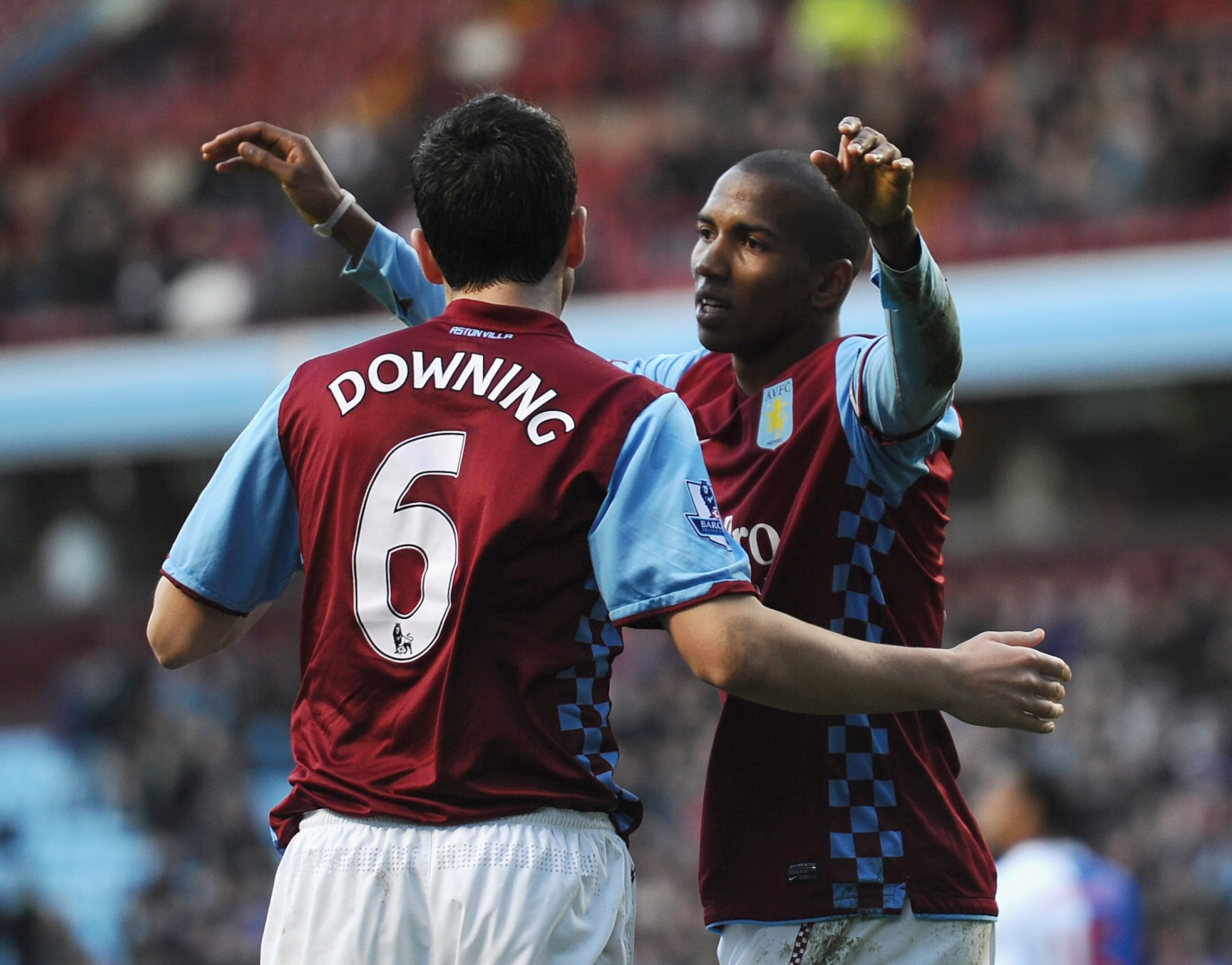 BIRMINGHAM, ENGLAND - FEBRUARY 26: Ashley Young of Aston Villa celebrates his second goal with Stewart Downing  during the Barclays Premier League match between Aston Villa and Blackburn Rovers at Villa Park on February 26, 2011 in Birmingham, England.  (