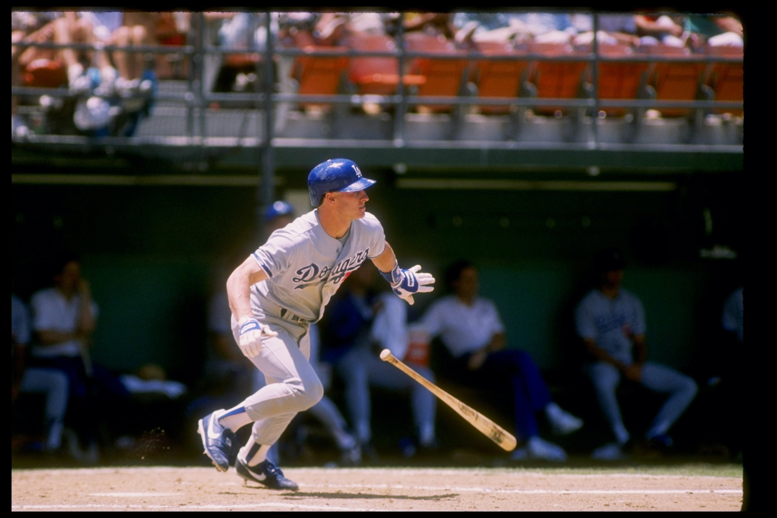 Second baseman Steve Sax of the Los Angeles Dodgers drops his bat and runs during a game.