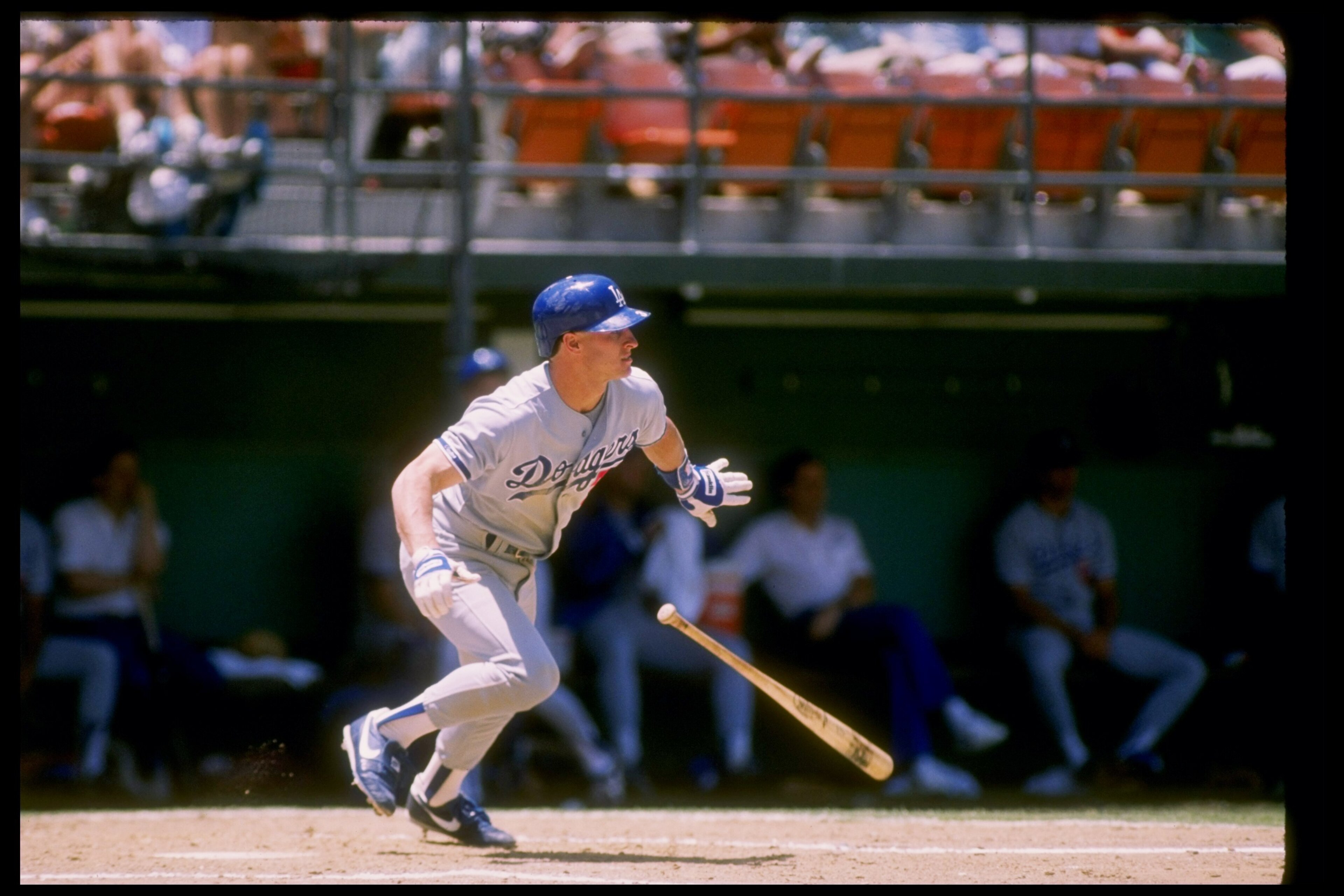 Second baseman Steve Sax of the Los Angeles Dodgers drops his bat and runs during a game.