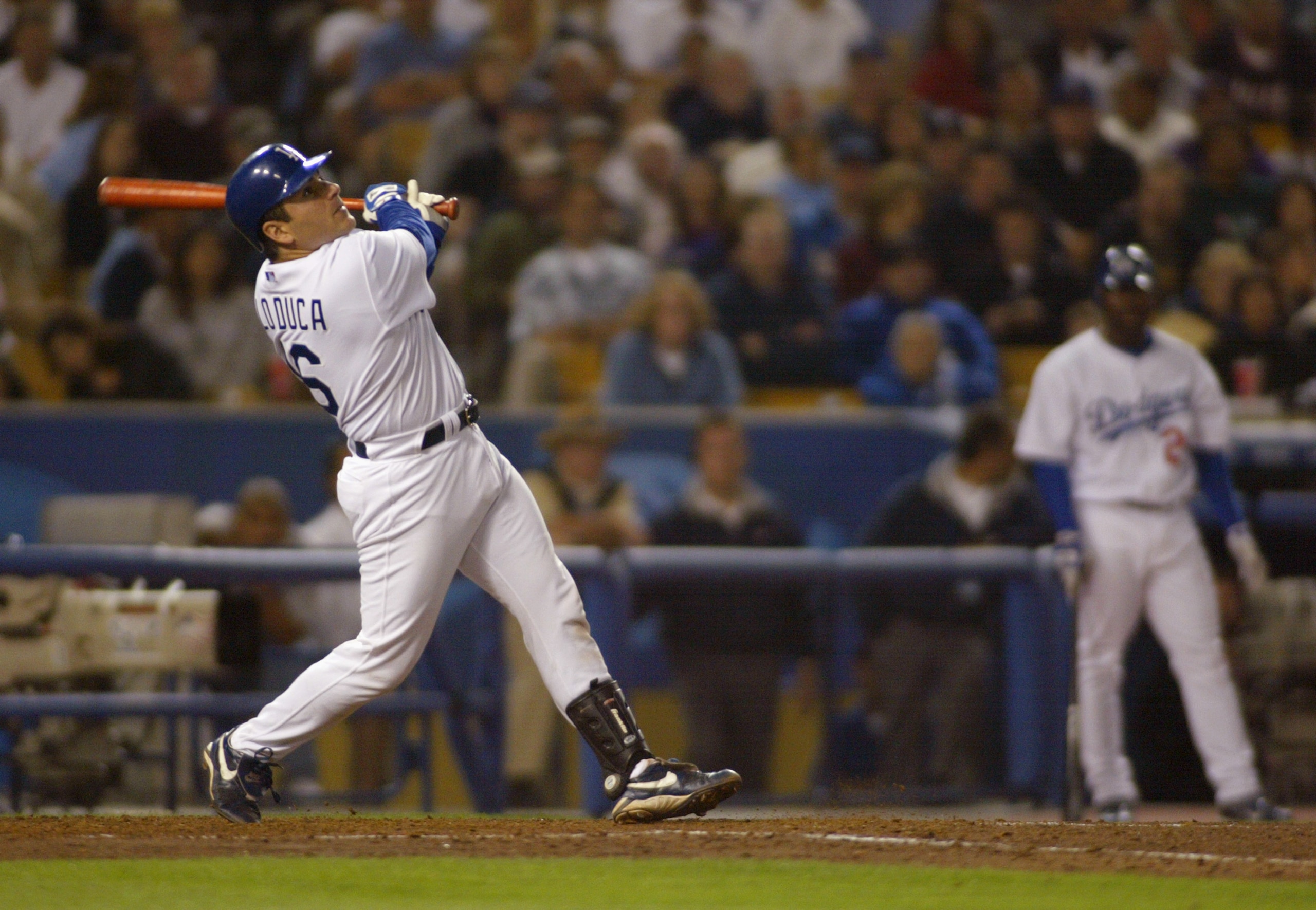 LOS ANGELES - MAY 28:  Catcher Paul Lo Duca #16 of the Los Angeles Dodgers at bat during the game against the Arizona Diamondbacks on May 28, 2004 at Dodger Stadium in Los Angeles, California.  The Diamondbacks won 6-3. (Photo by Lisa Blumenfeld/Getty Ima