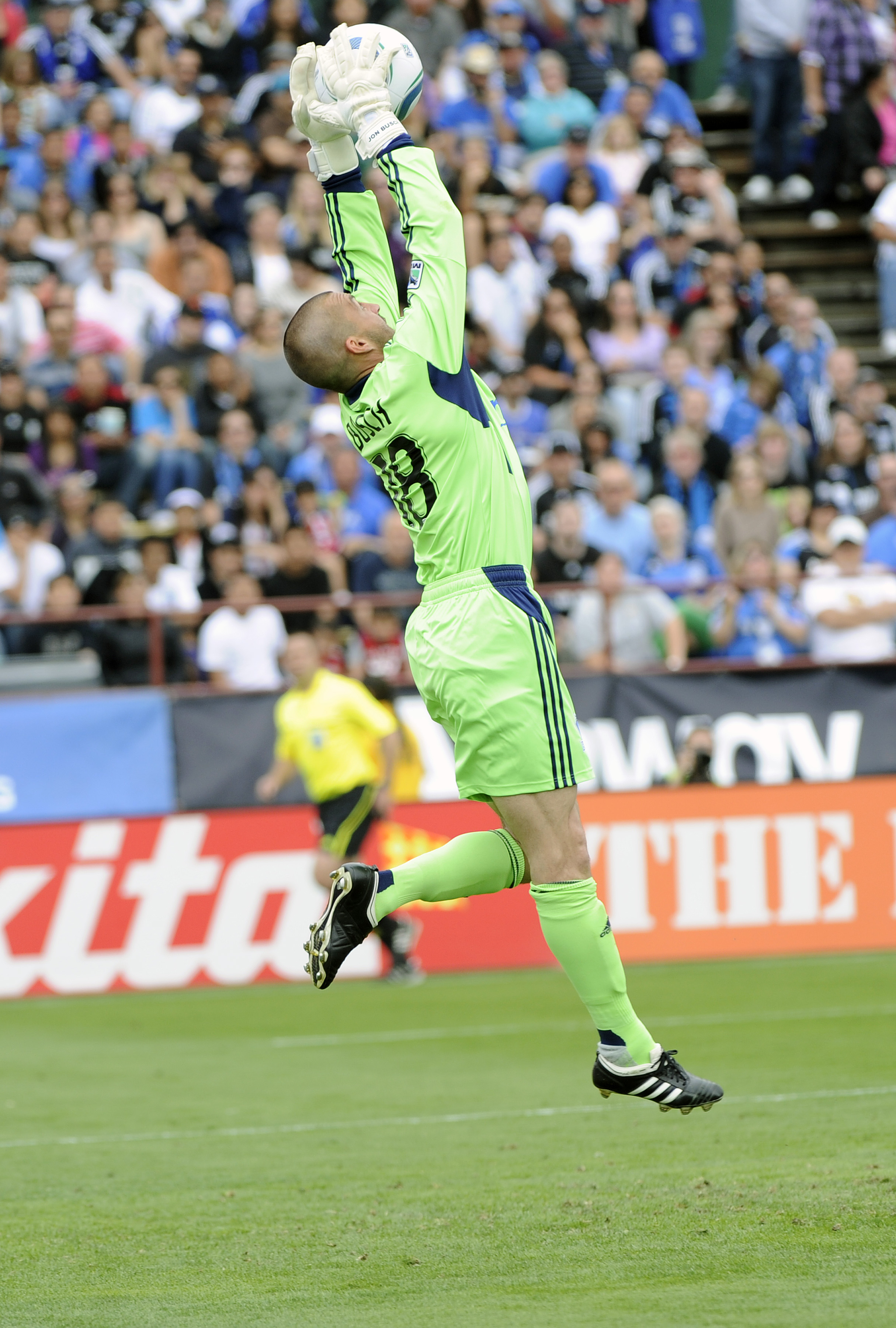 SANTA CLARA, CA - APRIL 23: Jon Busch #18 of the San Jose Earthquakes makes a leaping save against Chavis USA during an MLS soccer game at Buck Shaw Stadium on April 23, 2011 in Santa Clara, California. Chavis USA won the game 2-1. (Photo by Thearon W. He