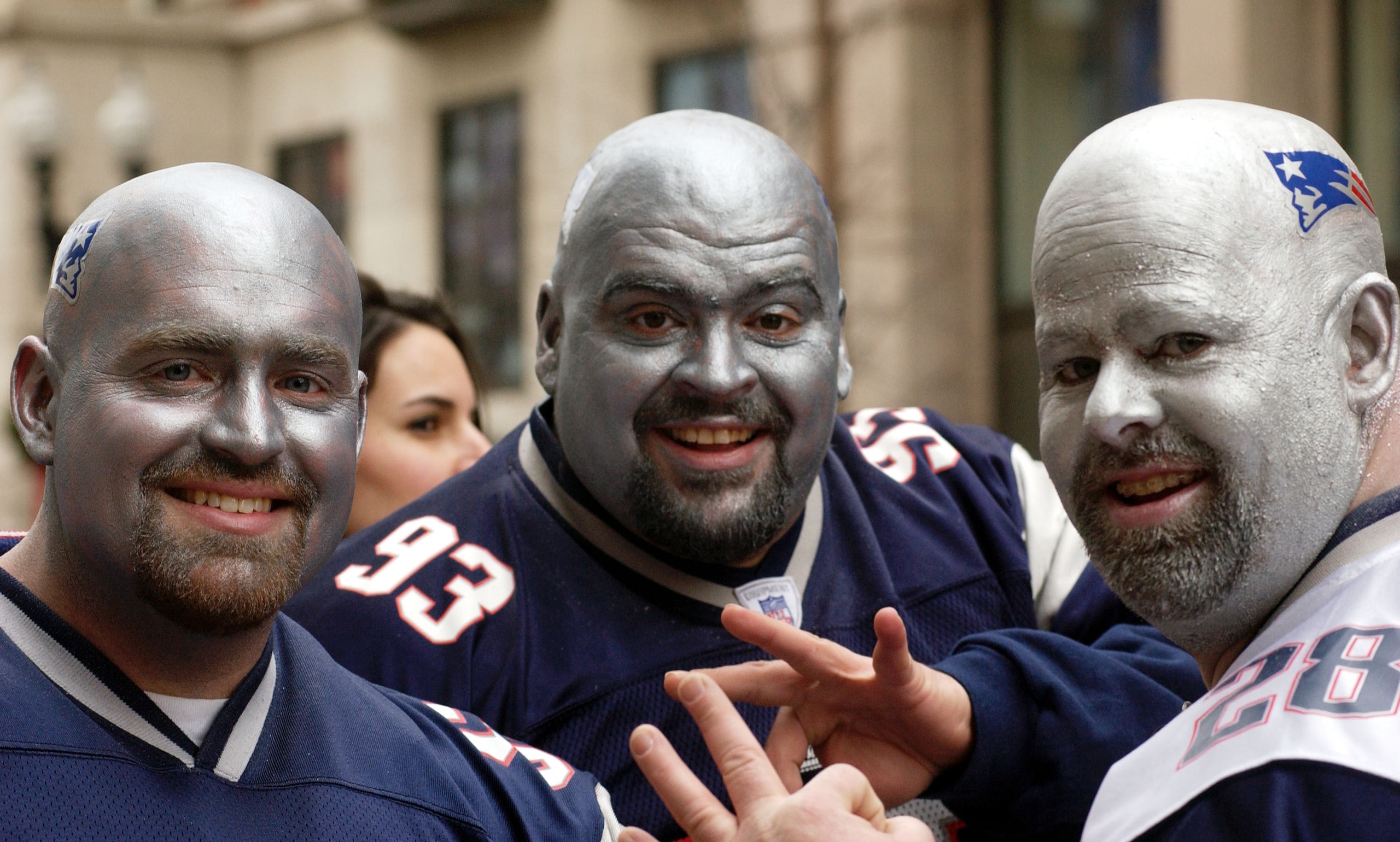 BOSTON - FEBRUARY 8:  (L to R) Dave Gott, Mike Cuthbertson and Fred Kapala celebrate the New England Patriot's Super Bowl victory during the Super Bowl victory parade February 8, 2005 in Boston, Massachusetts. The Patriots defeated the Philadelphia Eagles