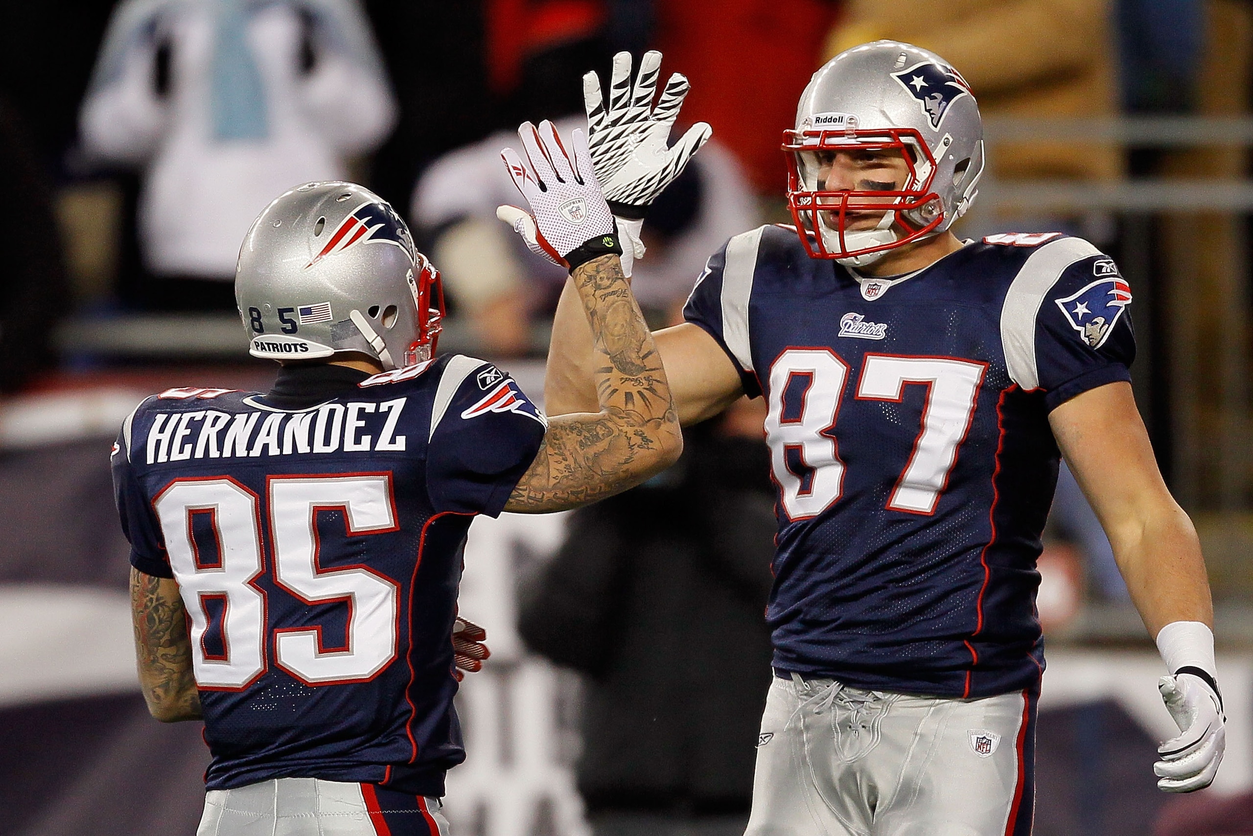 FOXBORO, MA - DECEMBER 06:  (L-R) Aaron Hernandez #85 and Rob Gronkowski #87 of the New England Patriots celebrate a play against the New York Jets at Gillette Stadium on December 6, 2010 in Foxboro, Massachusetts. The Patriots won 45-3. (Photo by Jim Rog