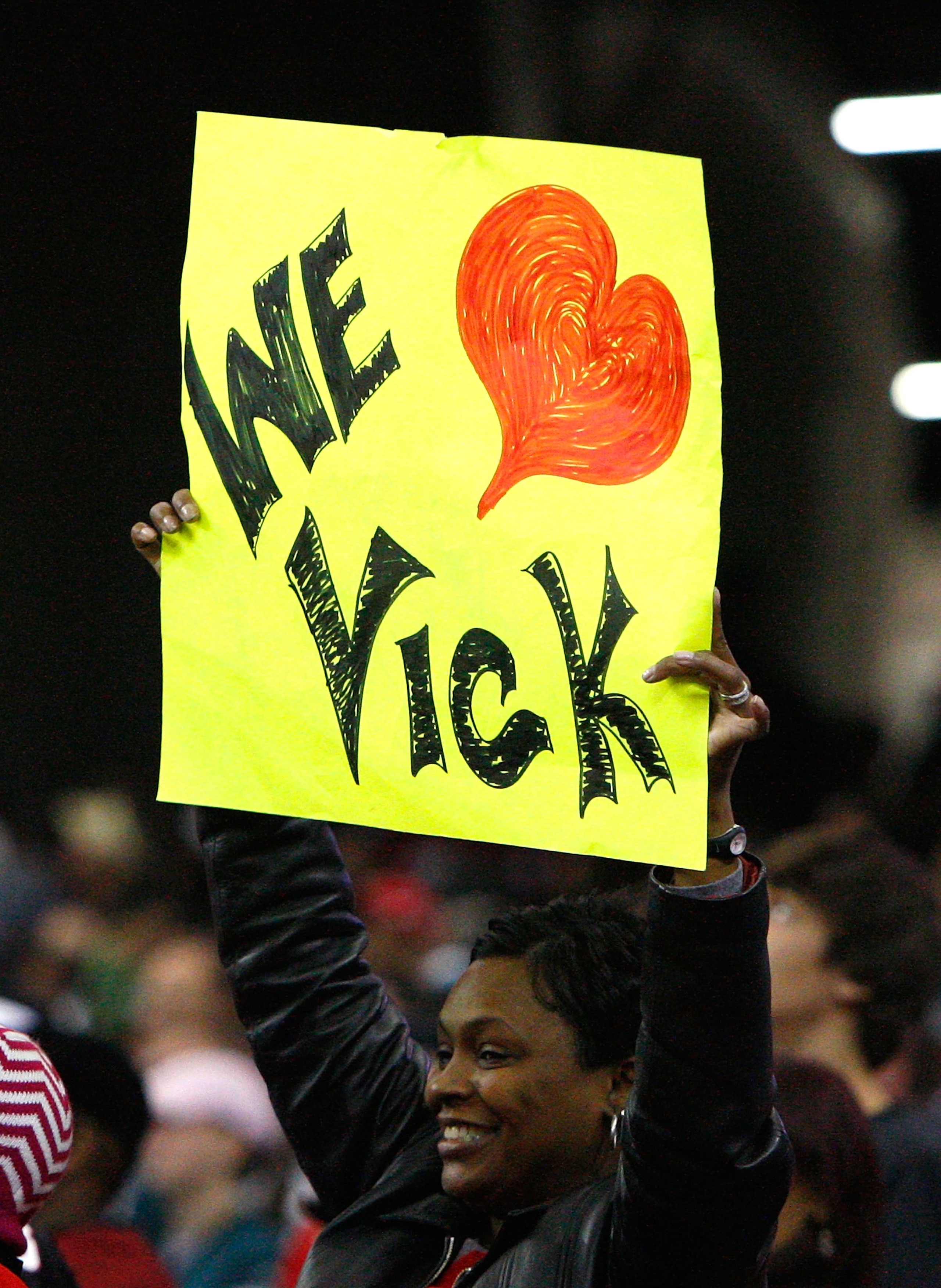 ATLANTA - DECEMBER 06:  A fan of Michael Vick #7 (not pictured) of the Philadelphia Eagles holds up a sign during the game against the Atlanta Falcons at Georgia Dome on December 6, 2009 in Atlanta, Georgia.  (Photo by Kevin C. Cox/Getty Images)