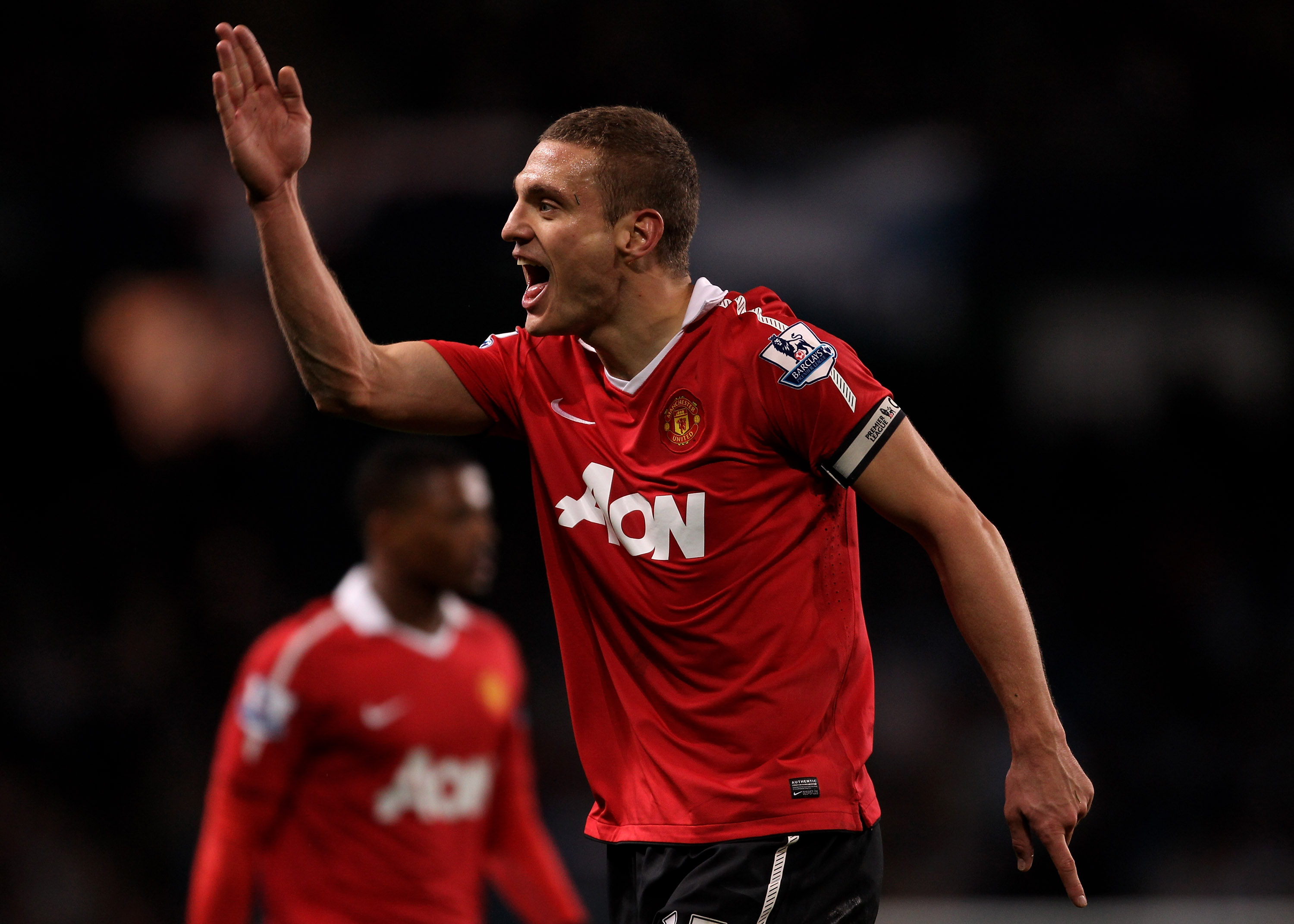 MANCHESTER, UNITED KINGDOM - NOVEMBER 10:   Nemanja Vidic of Manchester United reacts during the Barclays Premier League match between Manchester City and Manchester United at the City of Manchester Stadium on November 10, 2010 in Manchester, England. (Ph