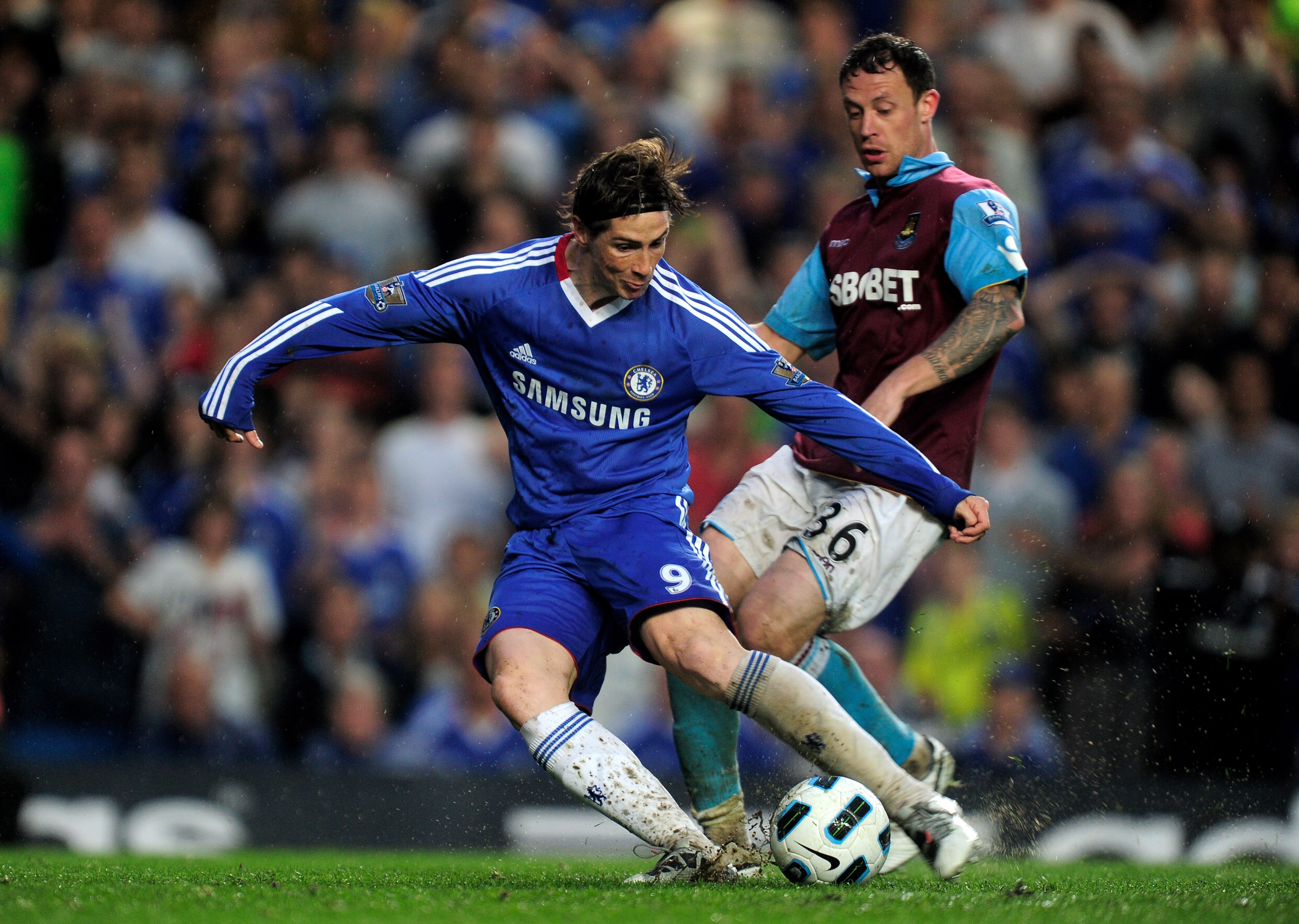 LONDON, ENGLAND - APRIL 23:  Fernando Torres of Chelsea scores his team's second goal and the first of his Chelsea career during the Barclays Premier League match between Chelsea and West Ham United at Stamford Bridge on April 23, 2011 in London, England.