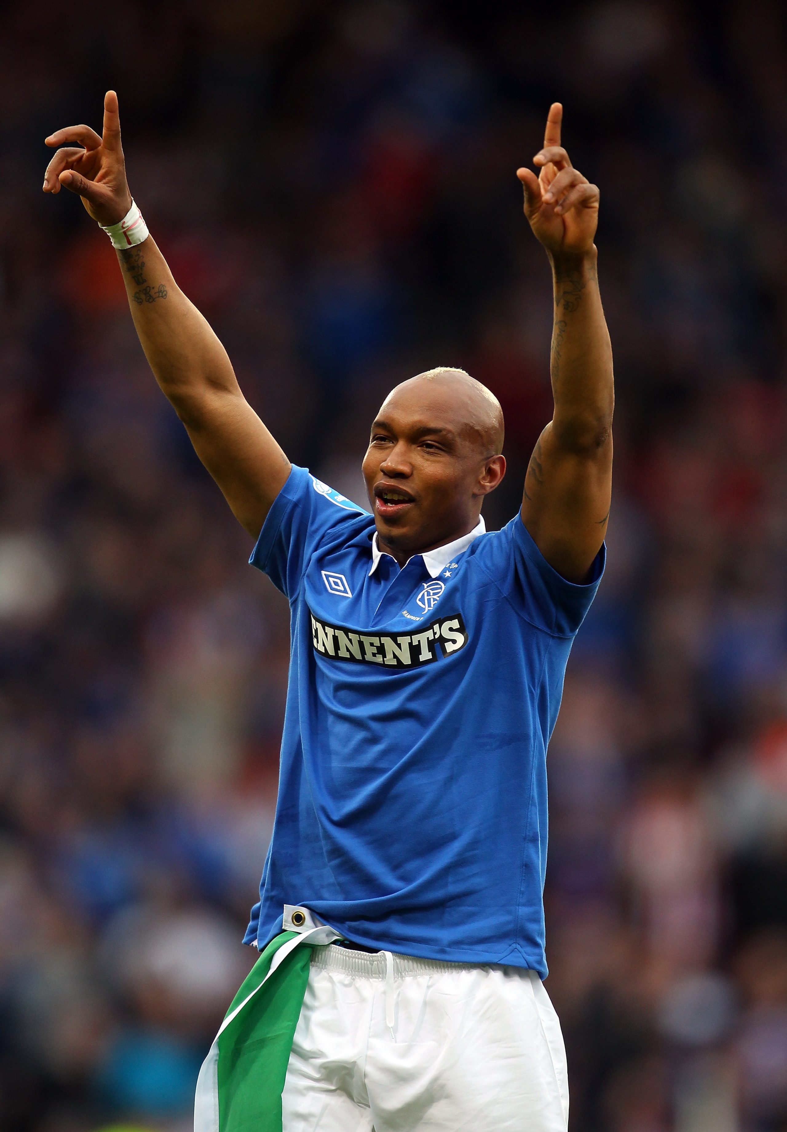 GLASGOW, SCOTLAND - MARCH 20:  El Hadji Diouf of Rangers celebrates winning over Celtic during the Co-operative Insurance Cup final between at Hampden Park on March 20, 2011 in Glasgow, Scotland.  (Photo by Julian Finney/Getty Images)
