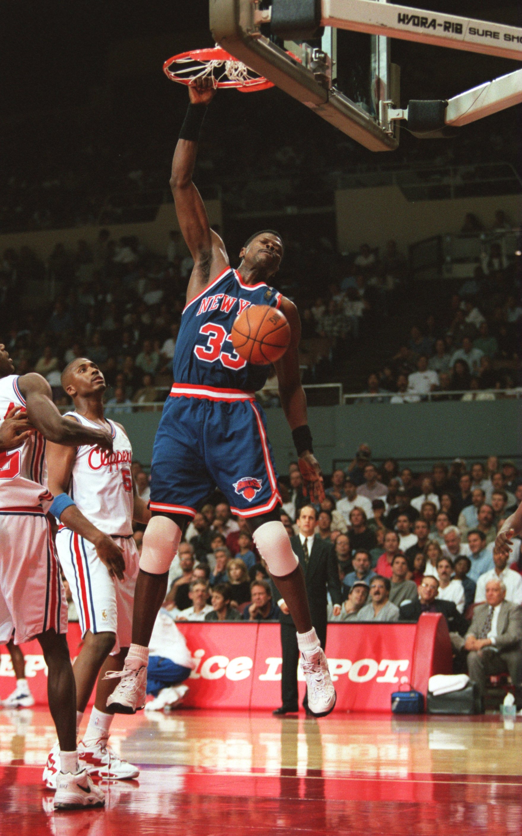Patrick Ewing of the New York Knicks dunks the ball during the 1990