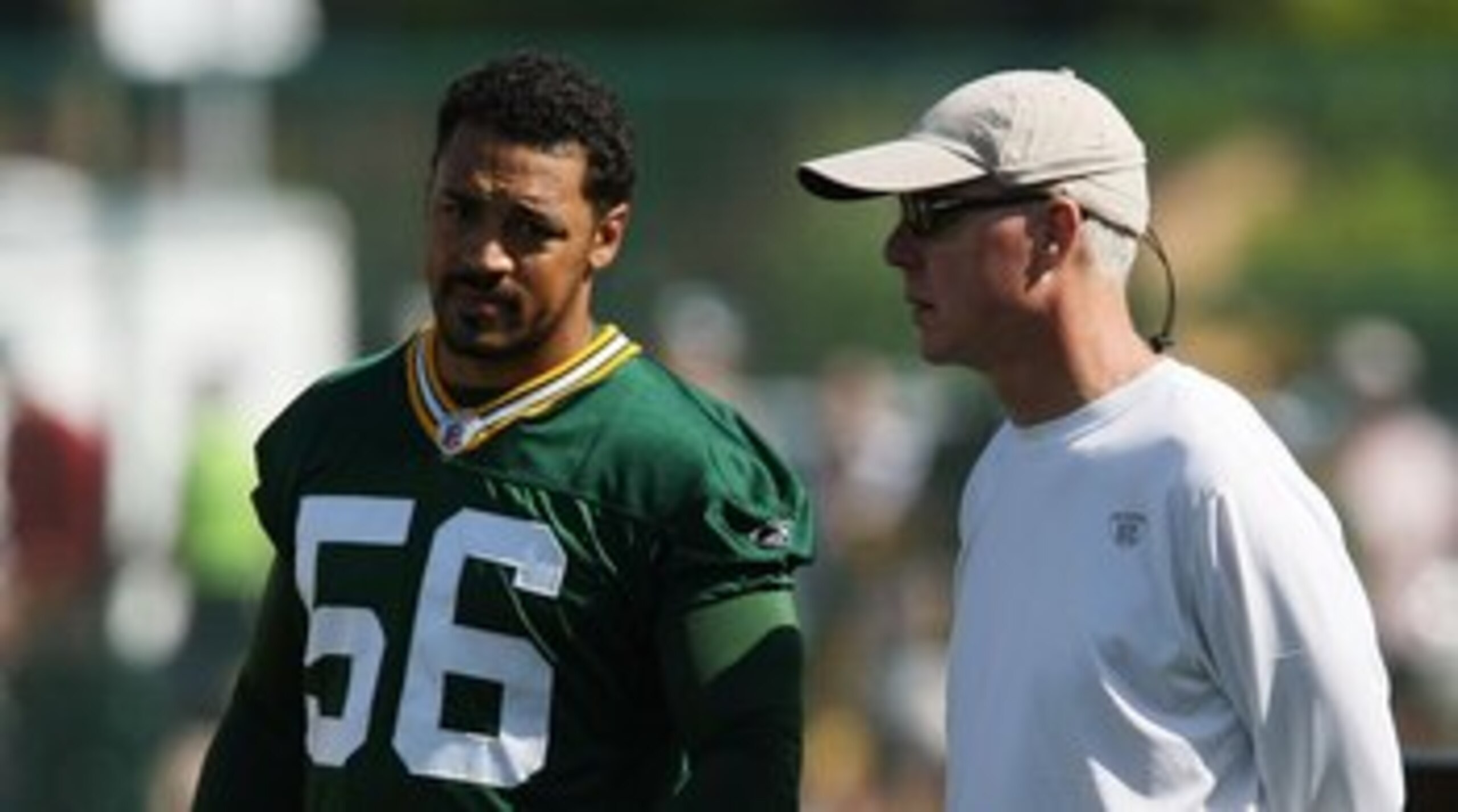 GREEN BAY, WI - JULY 28: General Manager Ted Thompson of the Green Bay Packers talks with Nick Barnett #56 during summer training camp on July 28, 2008 at the Hutson Center in Green Bay, Wisconsin. (Photo by Jonathan Daniel/Getty Images)